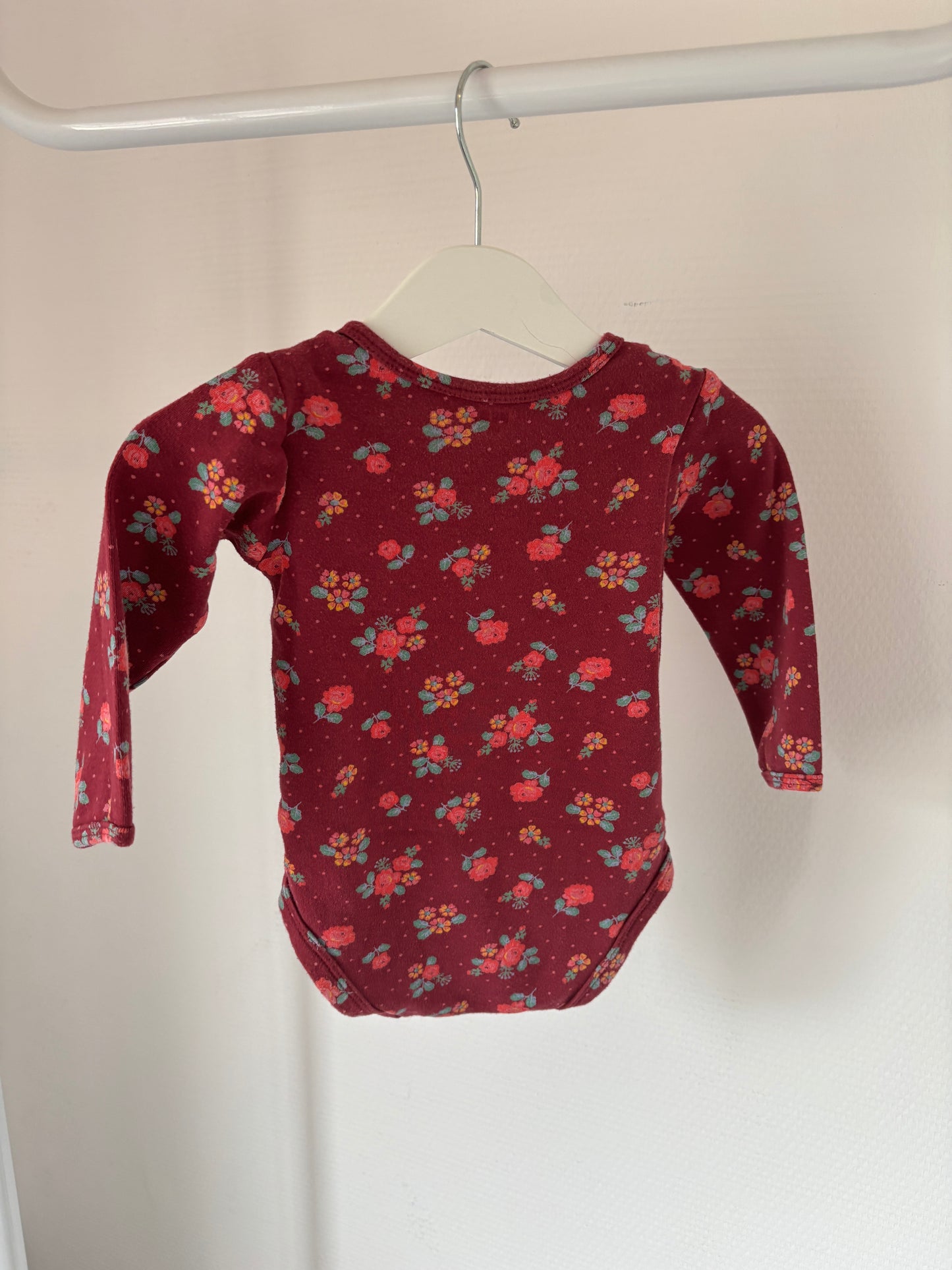 Wijnrode romper met lange mouwen