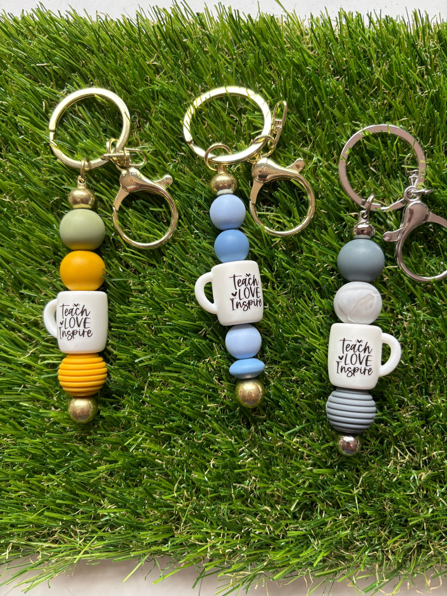 Sleutelhanger "Teach, love, inspire"