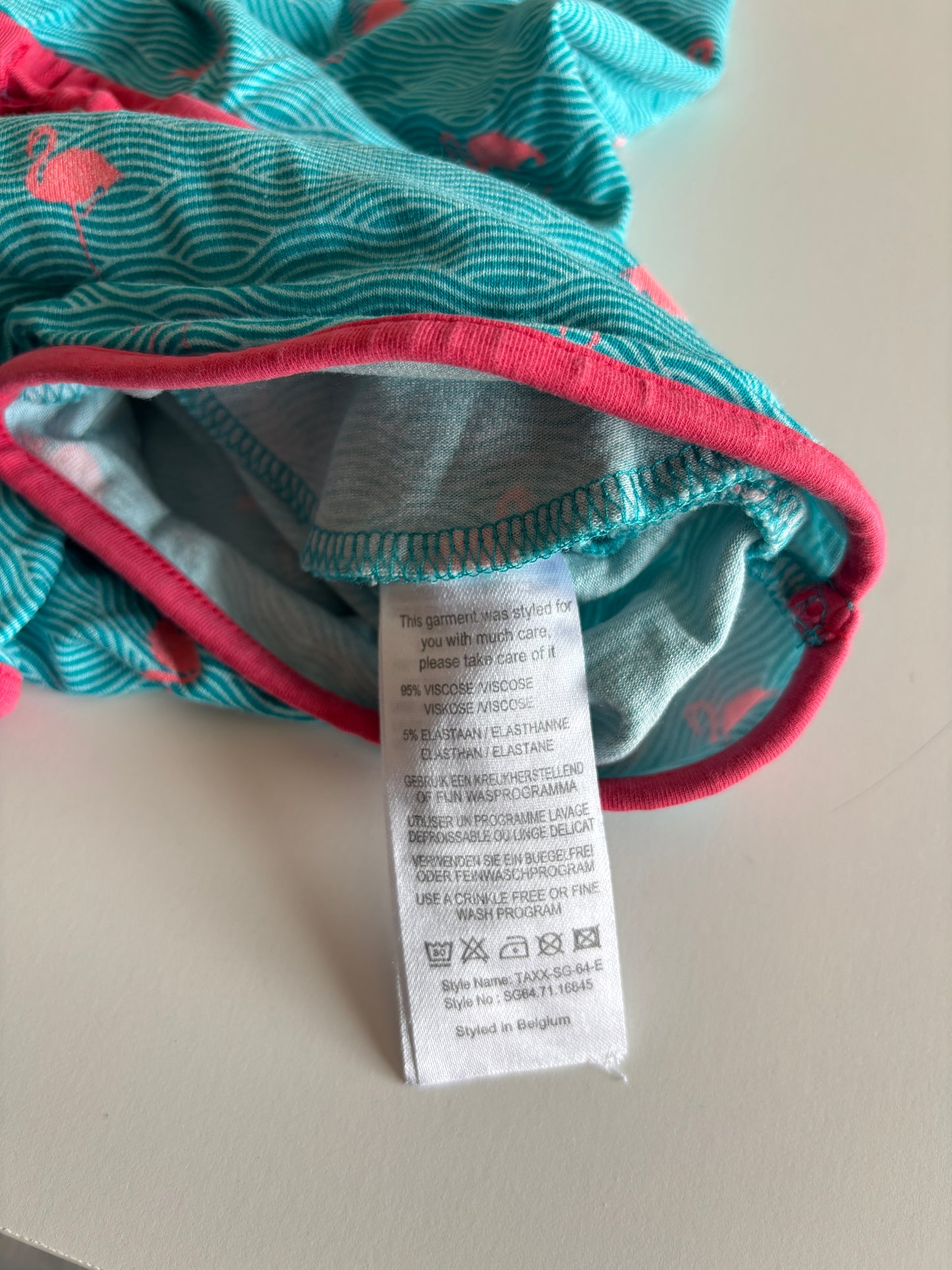 Lichtblauwe playsuit met flamingo's