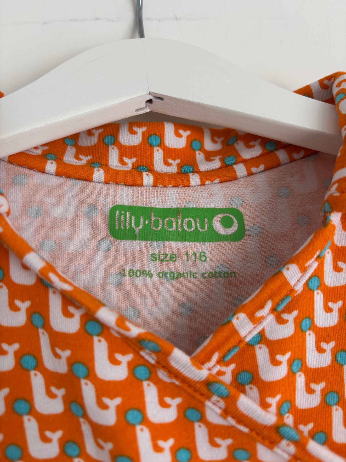 Oranje jurkje met zeehondjes