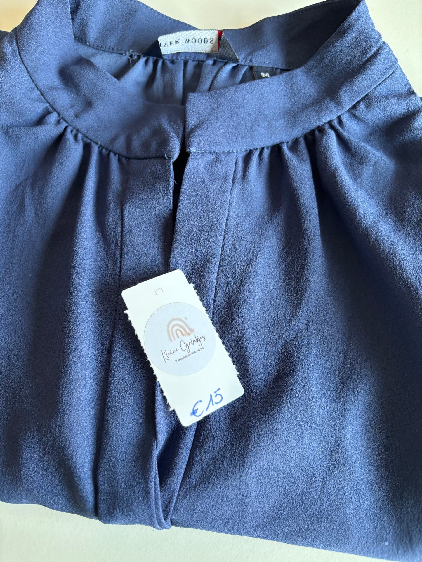 Donkerblauwe mouwloze blouse