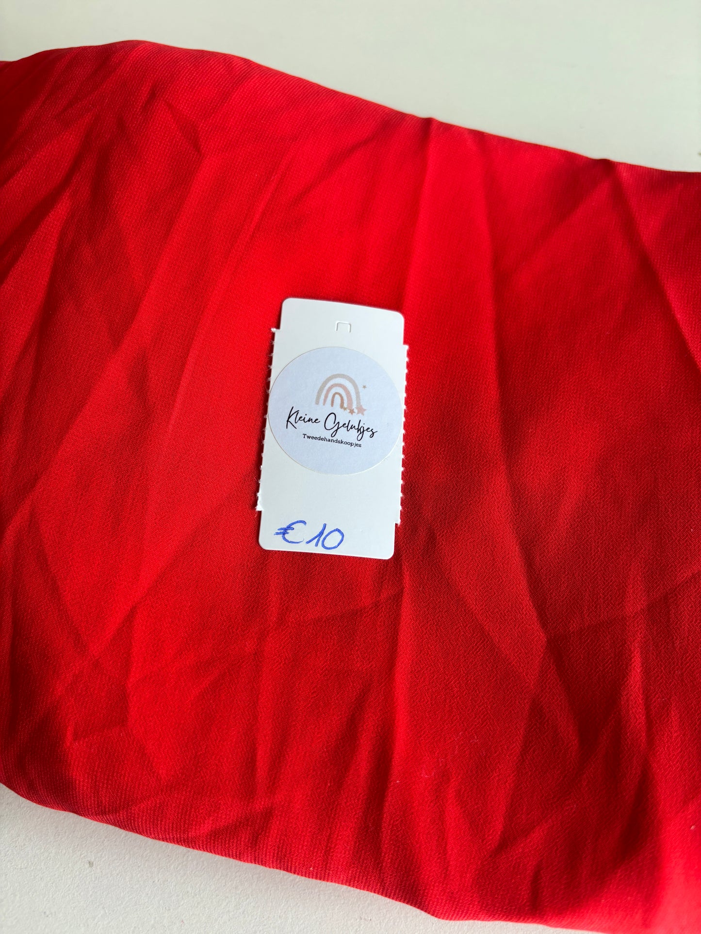 Rode mouwloze lange jurk