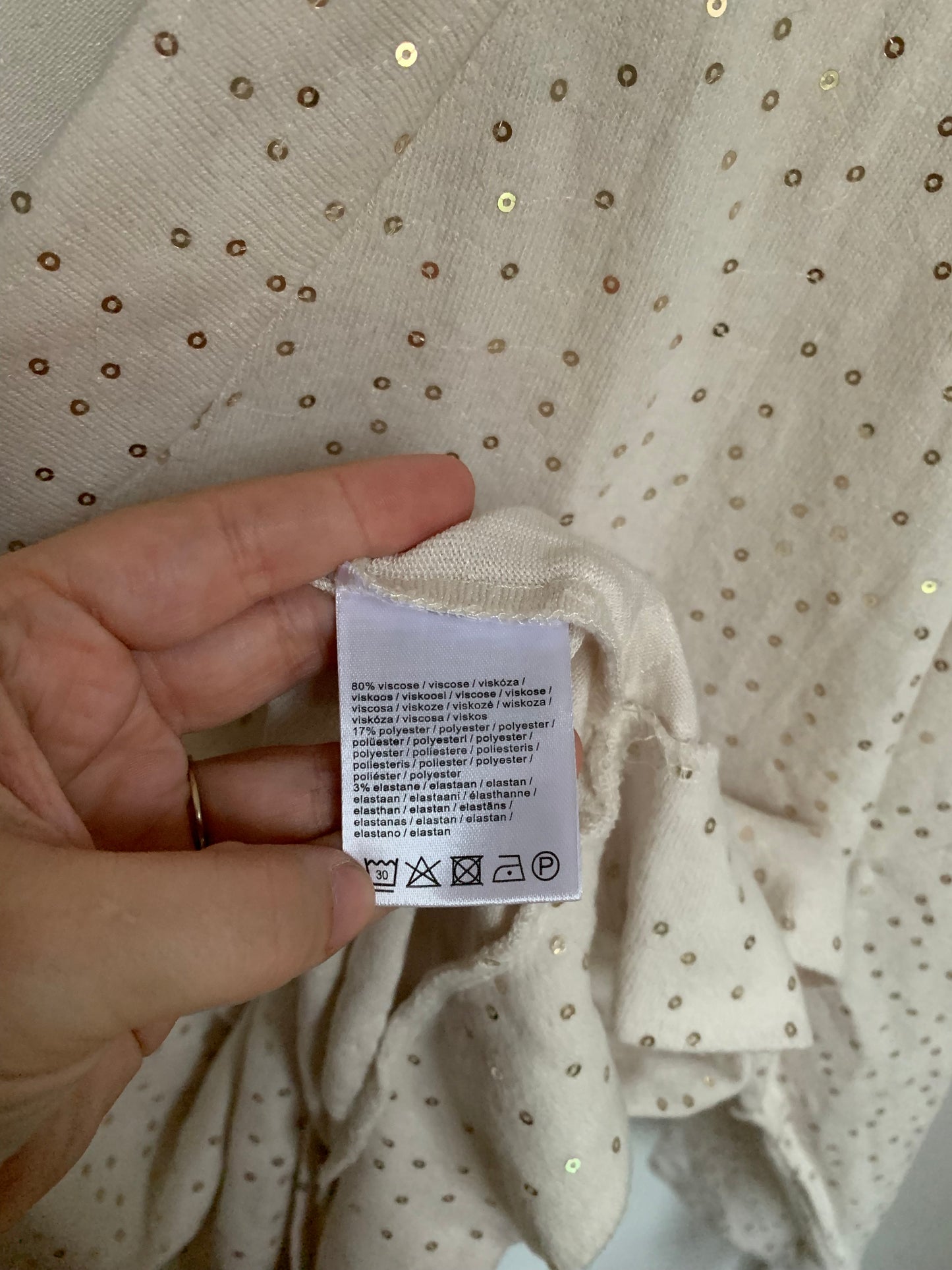 Witte blouse met gouden glitters