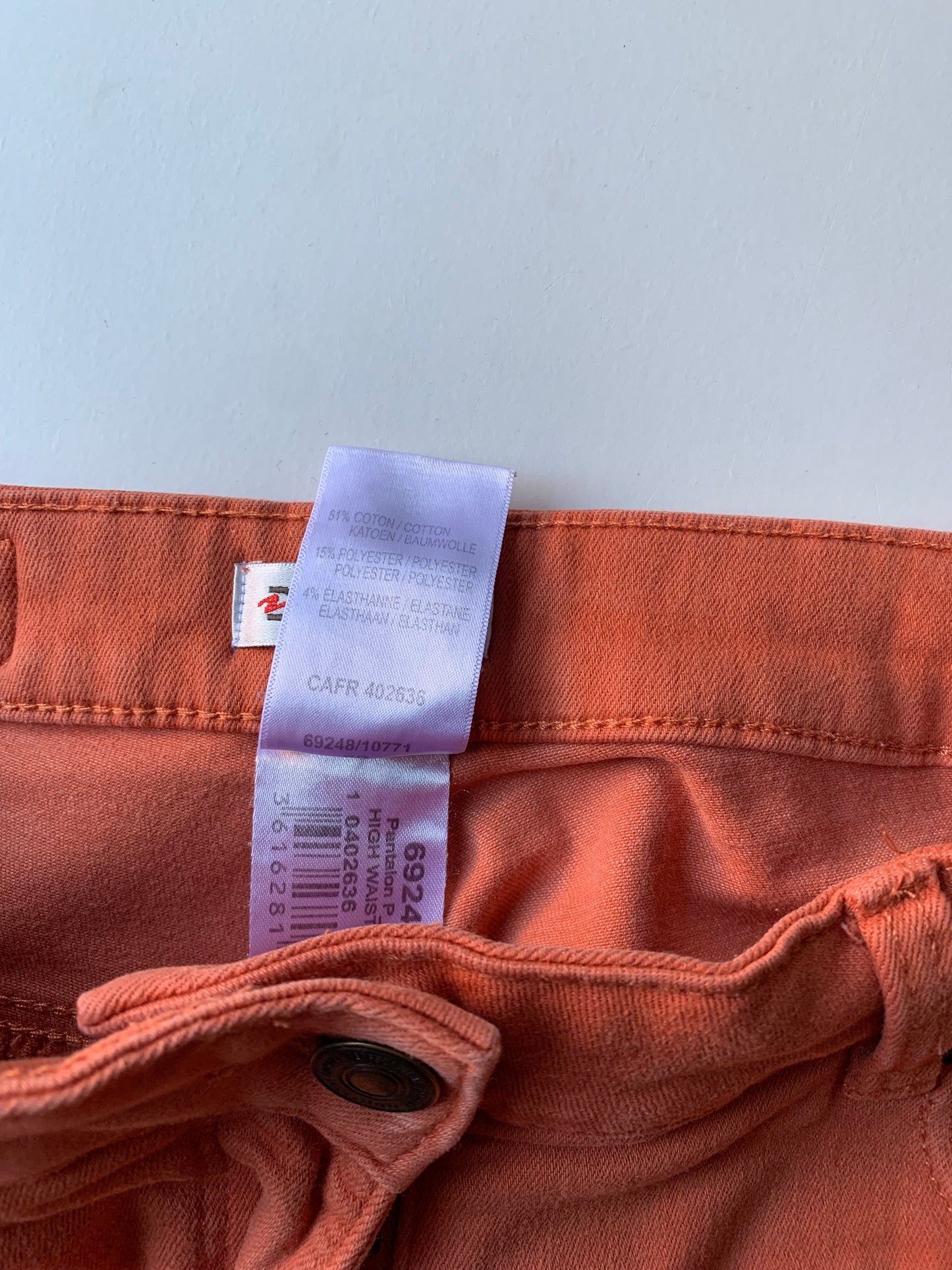 Oranje/roestkleurige jeansbroek