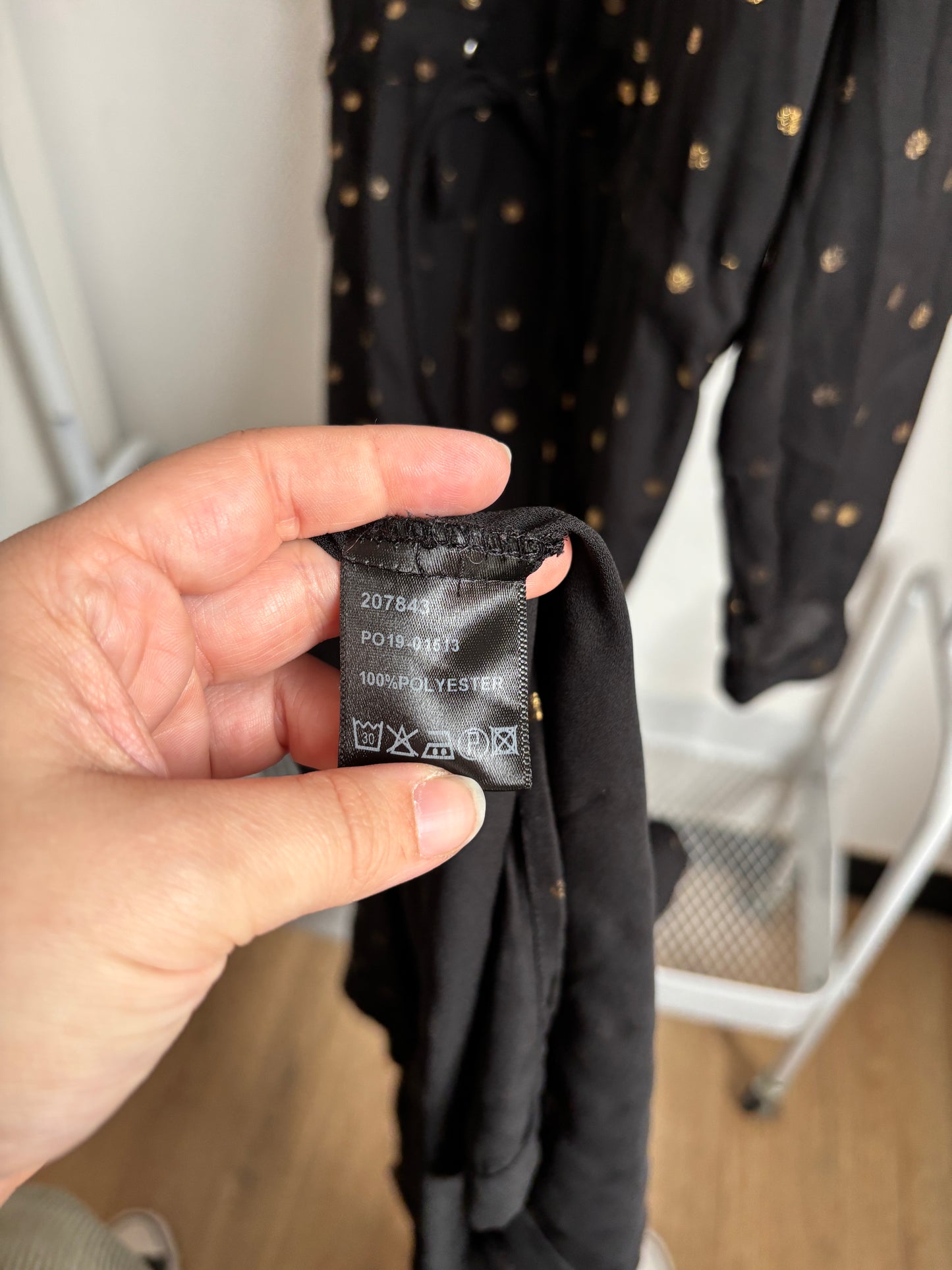 Zwarte lange jurk met gouden bolletjes