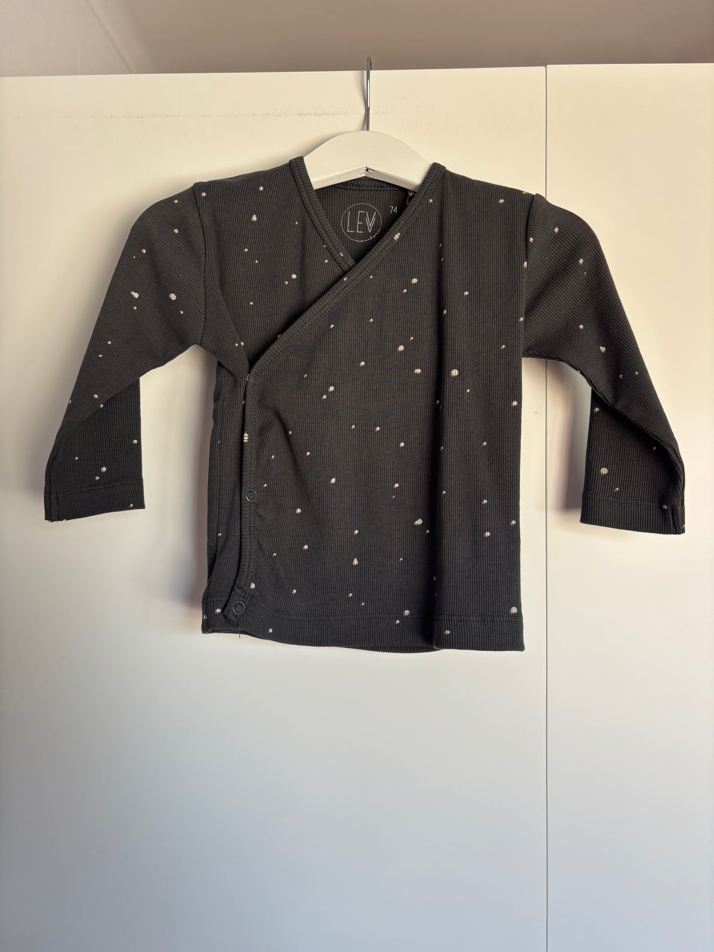 Donkergrijze gestippelde ribsoverslaglongsleeve