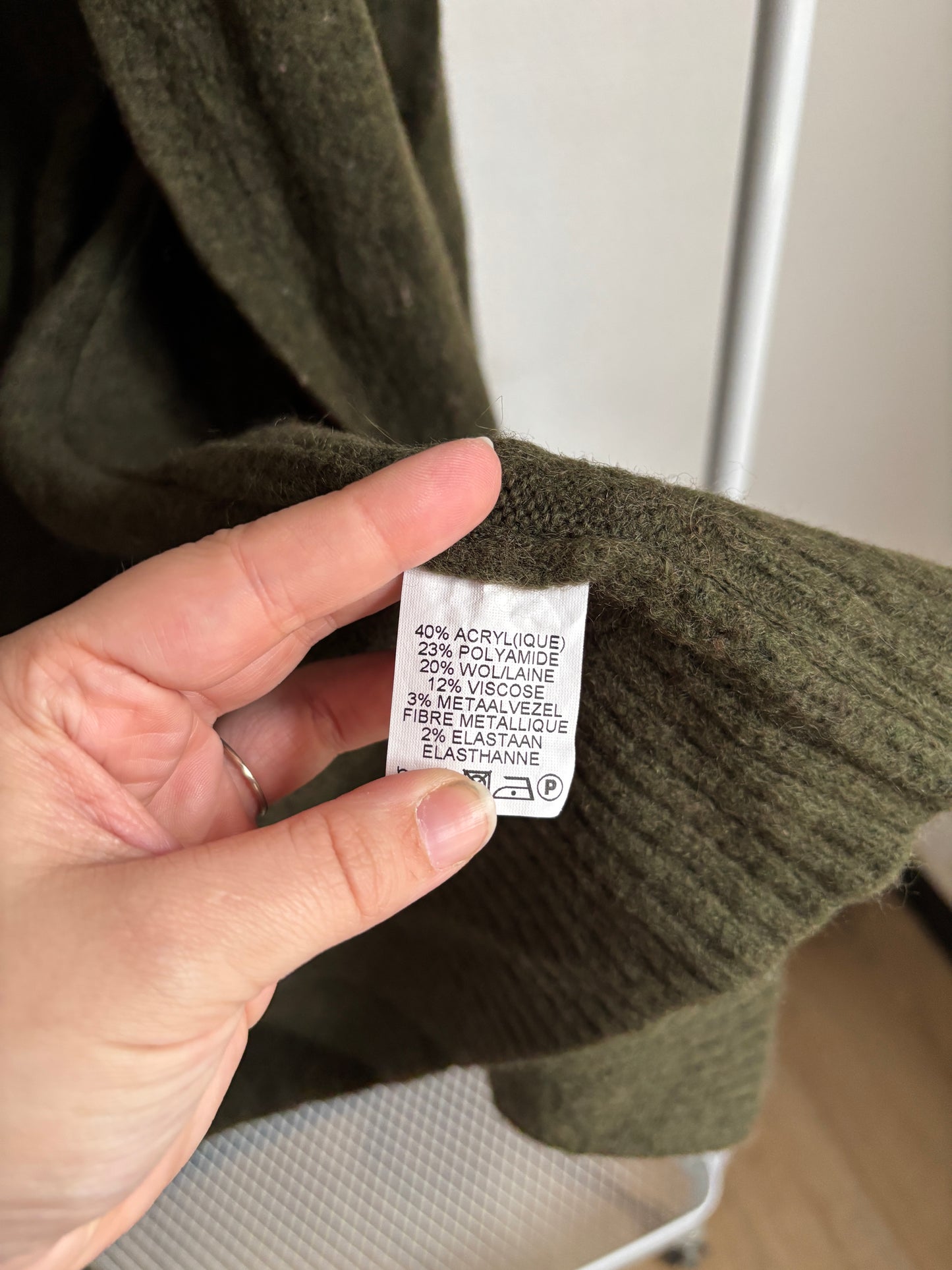 Donkergroene vest met gouden boord