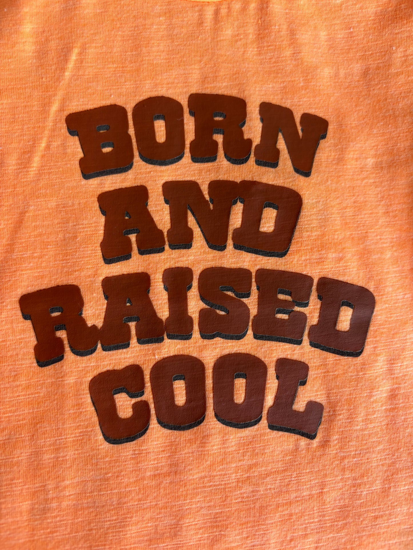 Oranje T-shirt "Born and raised cool"
