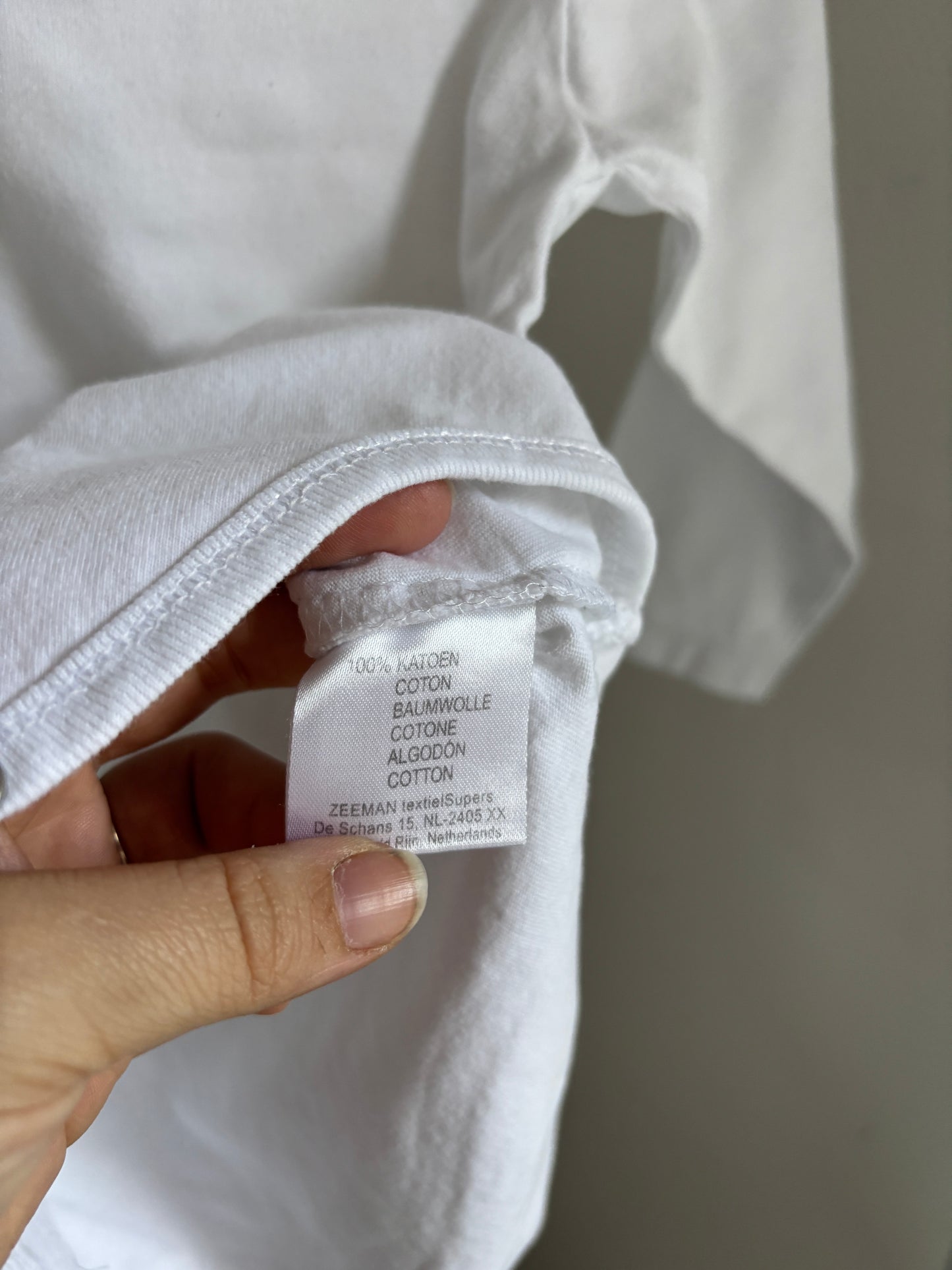 Witte romper met lange mouwen