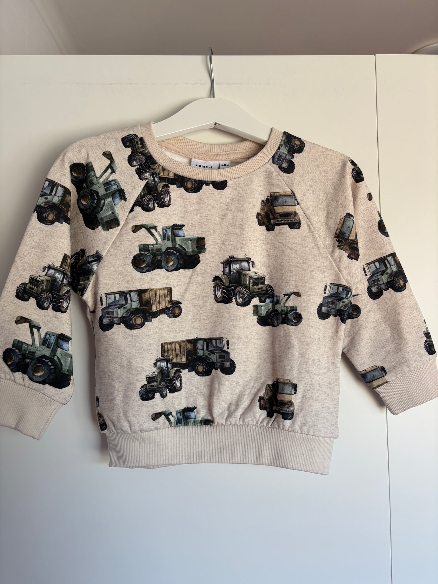 Crèmekleurige sweater met traktors