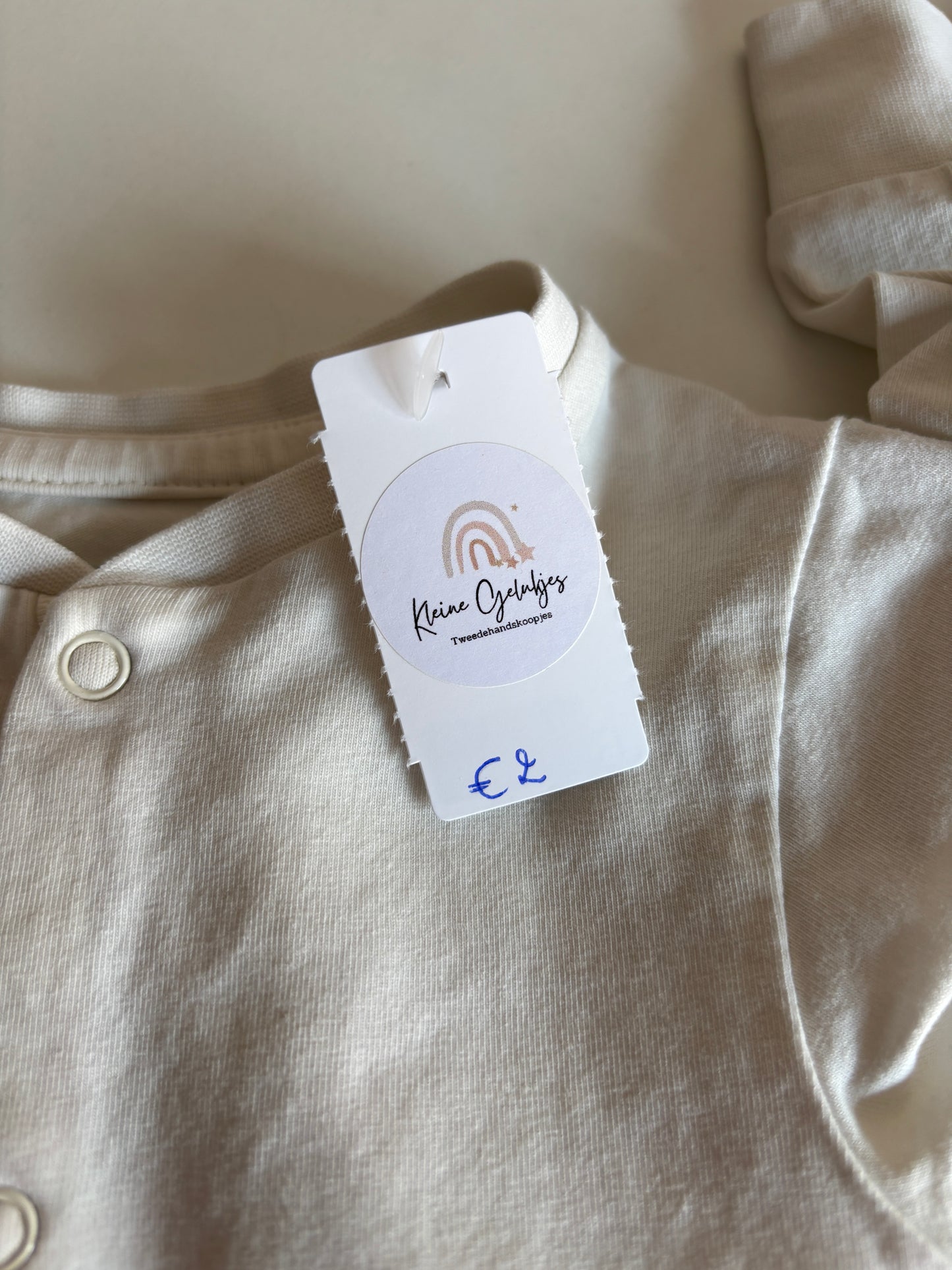 Crèmekleurige eendelige pyjama