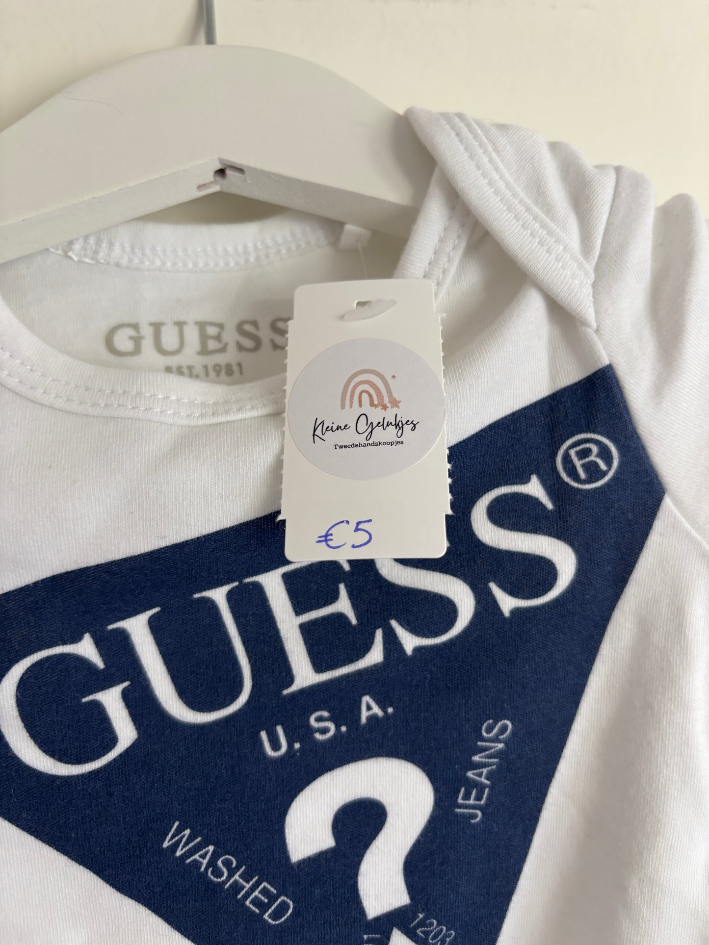 Witte romper met lange mouwen