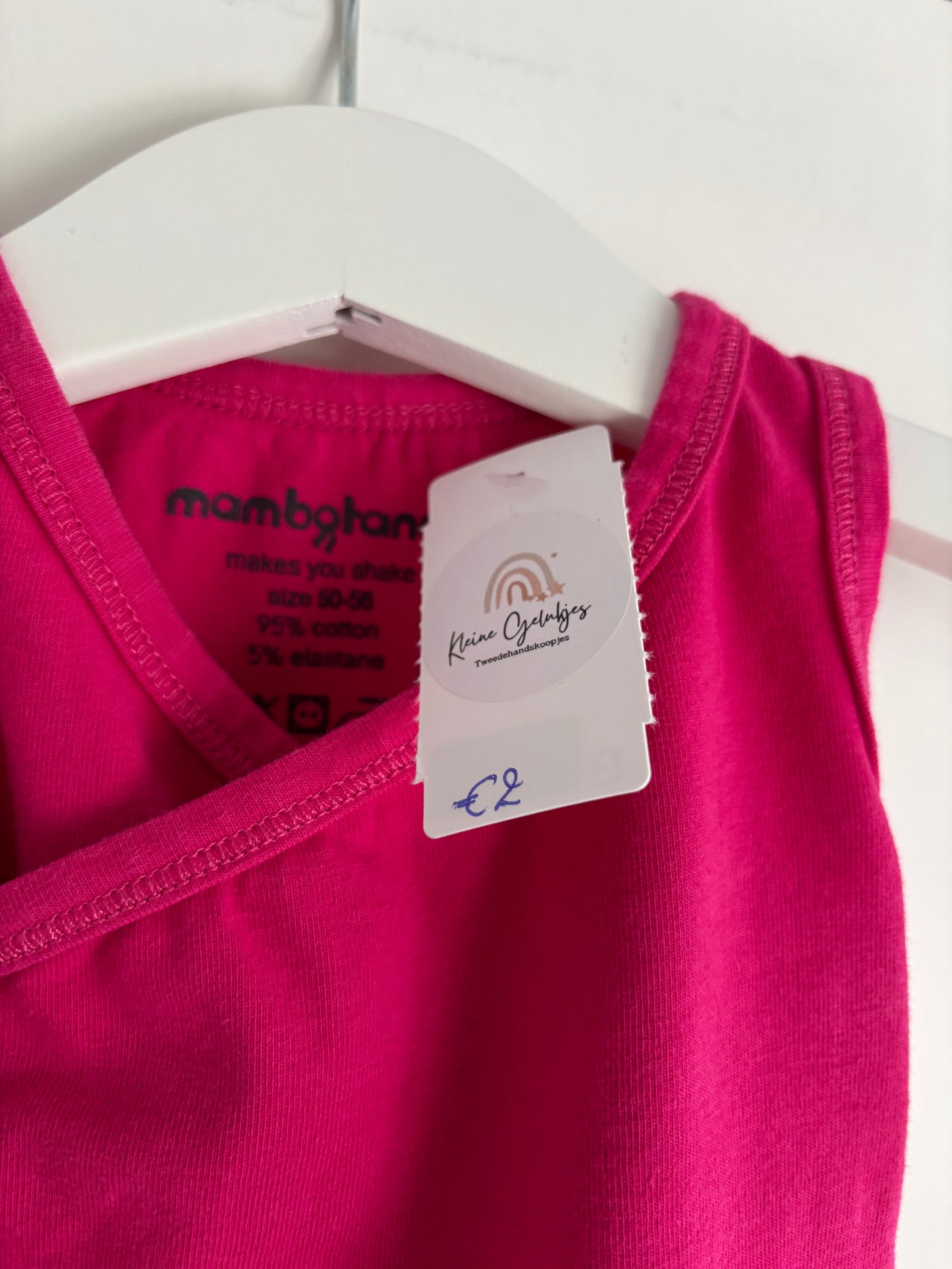 Roze overslagromper zonder mouwen