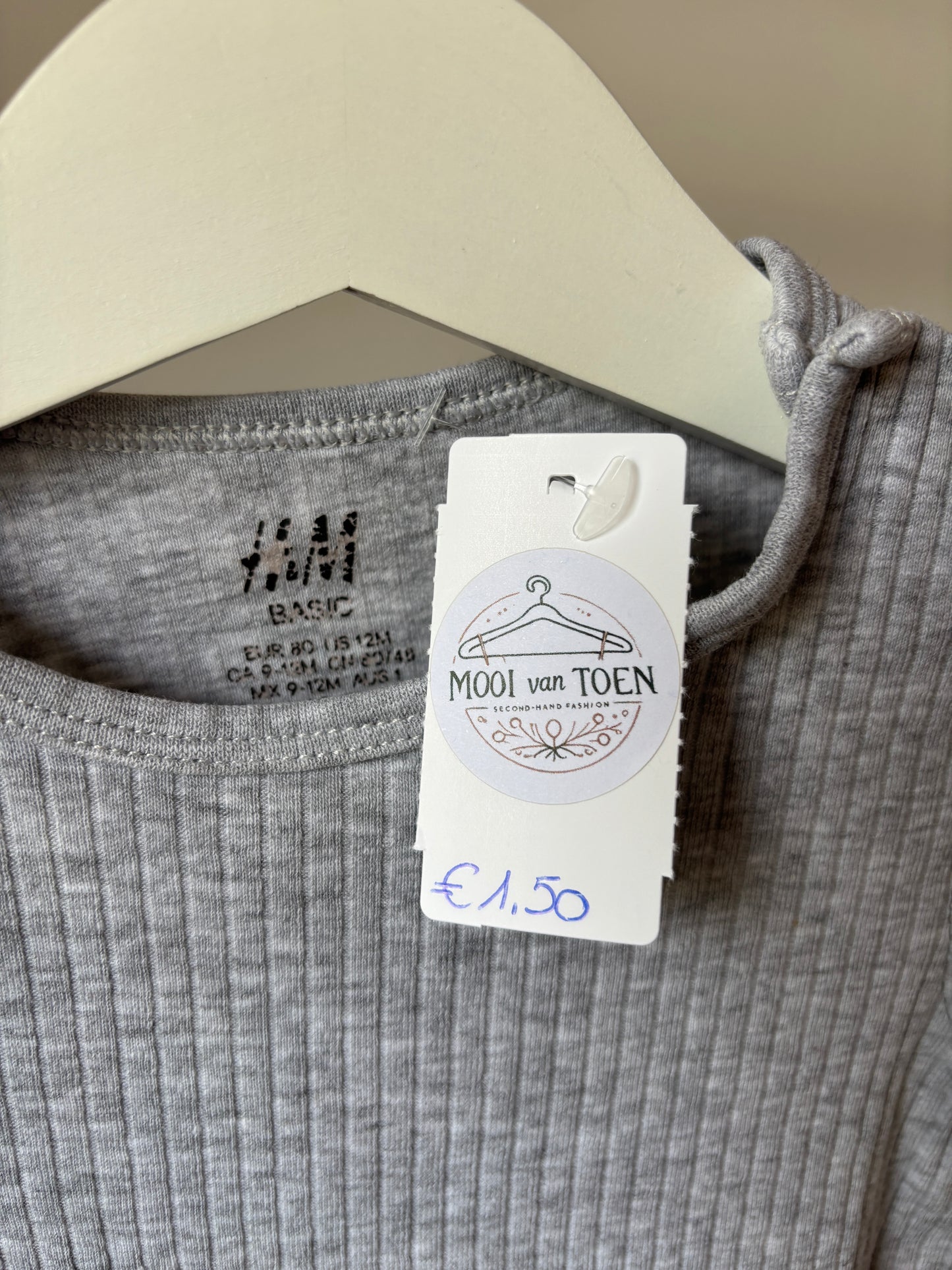 Lichtgrijze ribromper