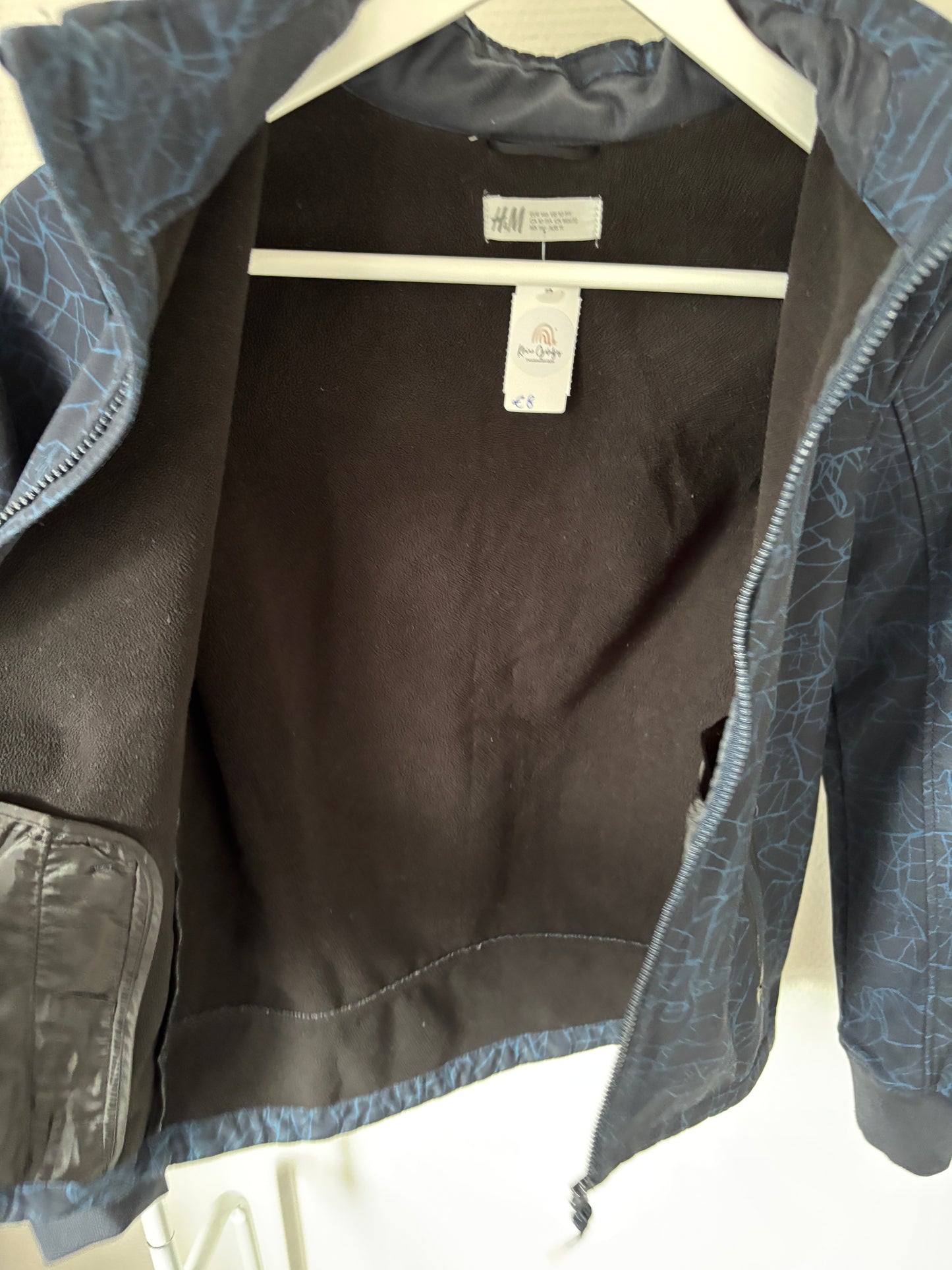 Marineblauwe winddichte jas