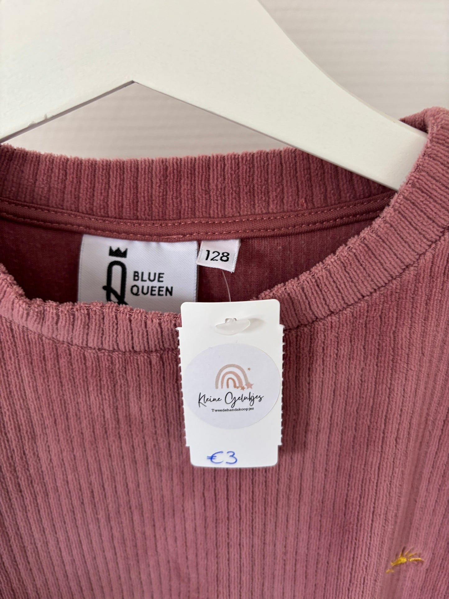 Roze ribfluwelen trui