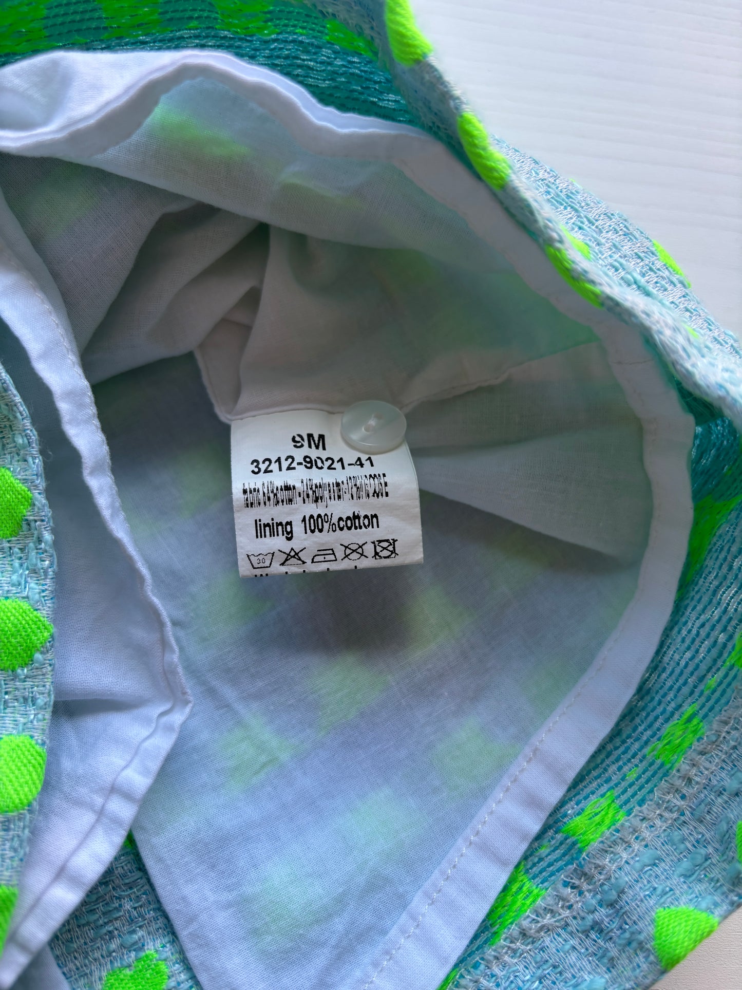 Lichtblauw jurkje met groene hartjes