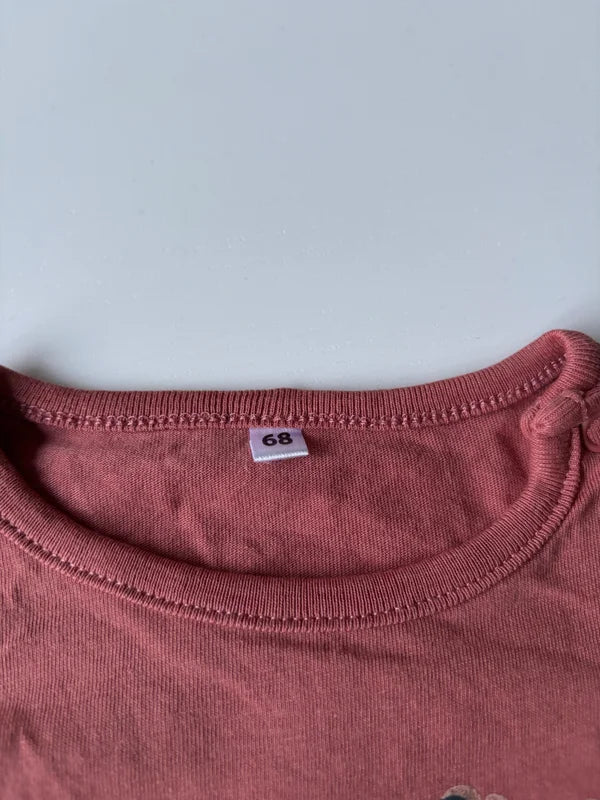 Roestkleurige longsleeve met panterhartje