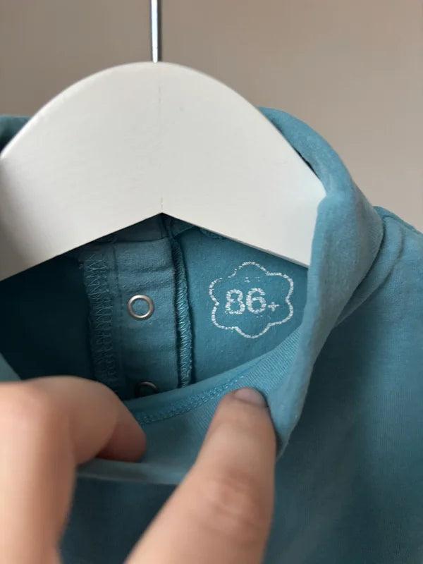 Blauwe longsleeve met rolkraag