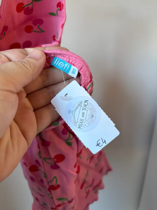 Roze jurk met kersjes