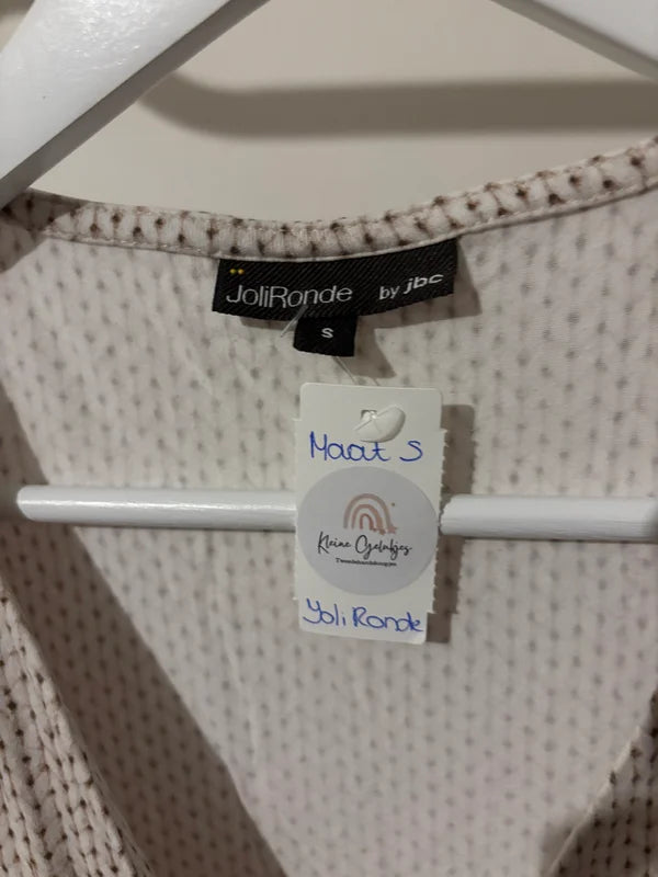 Witte gestippelde zwangerschapsblouse