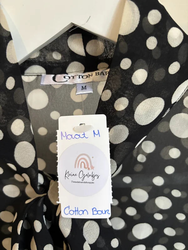 Zwarte blouse met stippen