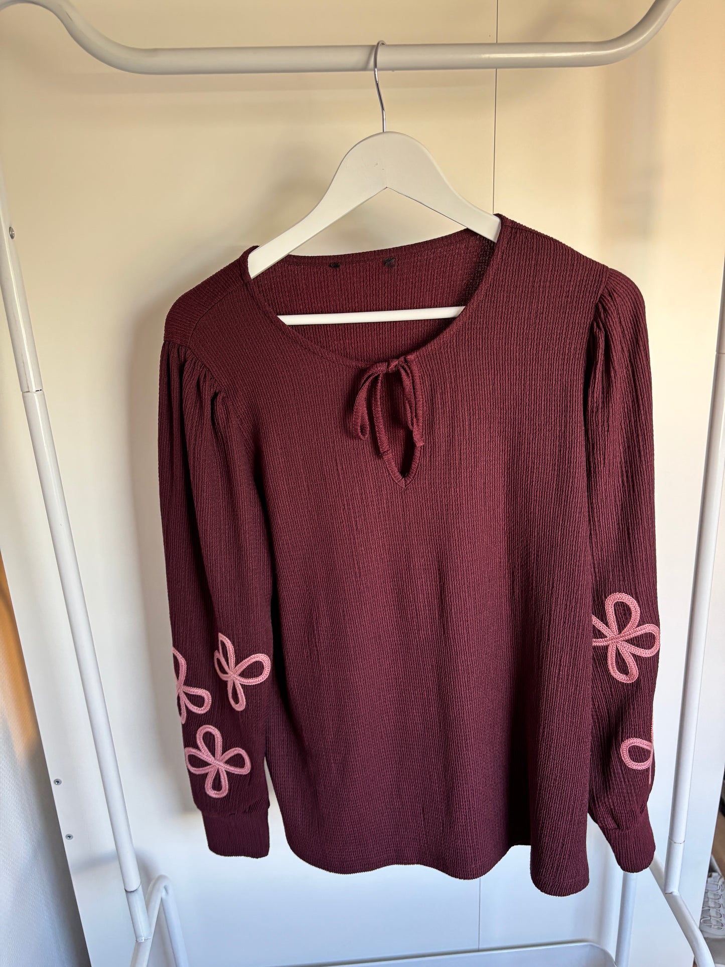 Blouse met bloemen op de mouw