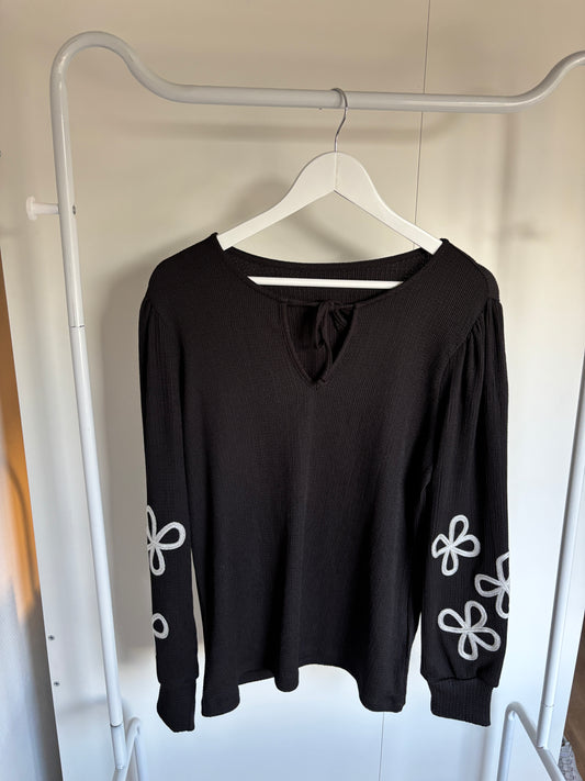 Blouse met bloemen op de mouw