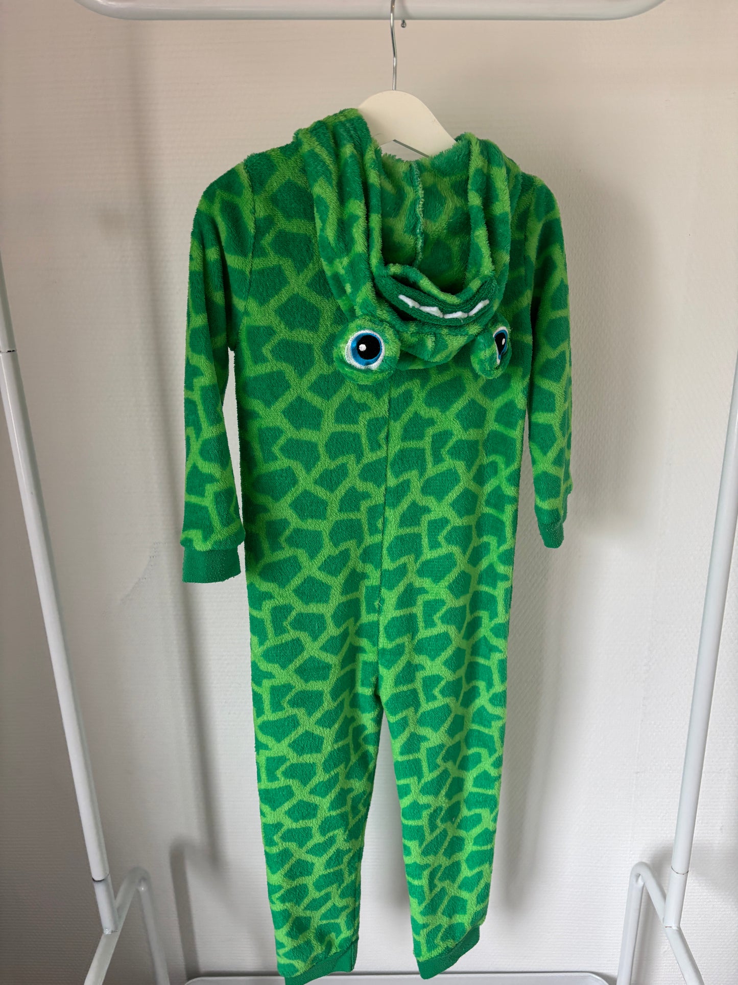 Groene dino-onesie