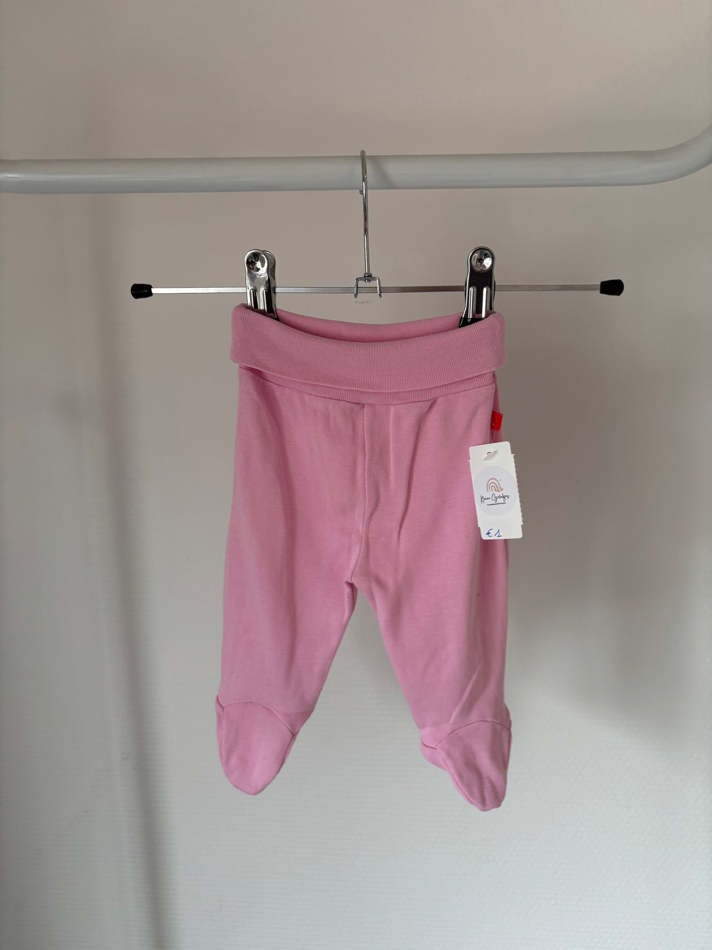 Roze zachte broek met voetjes