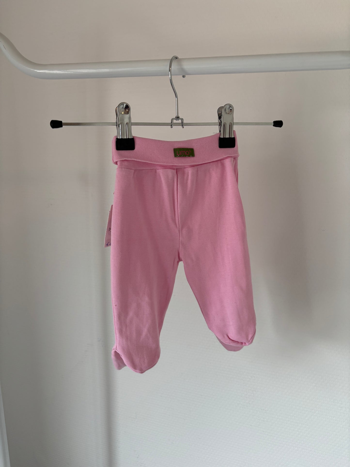 Roze zachte broek met voetjes