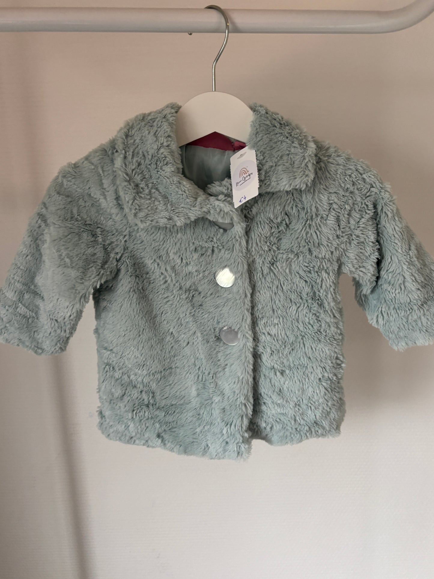 Lichtblauw winterjasje