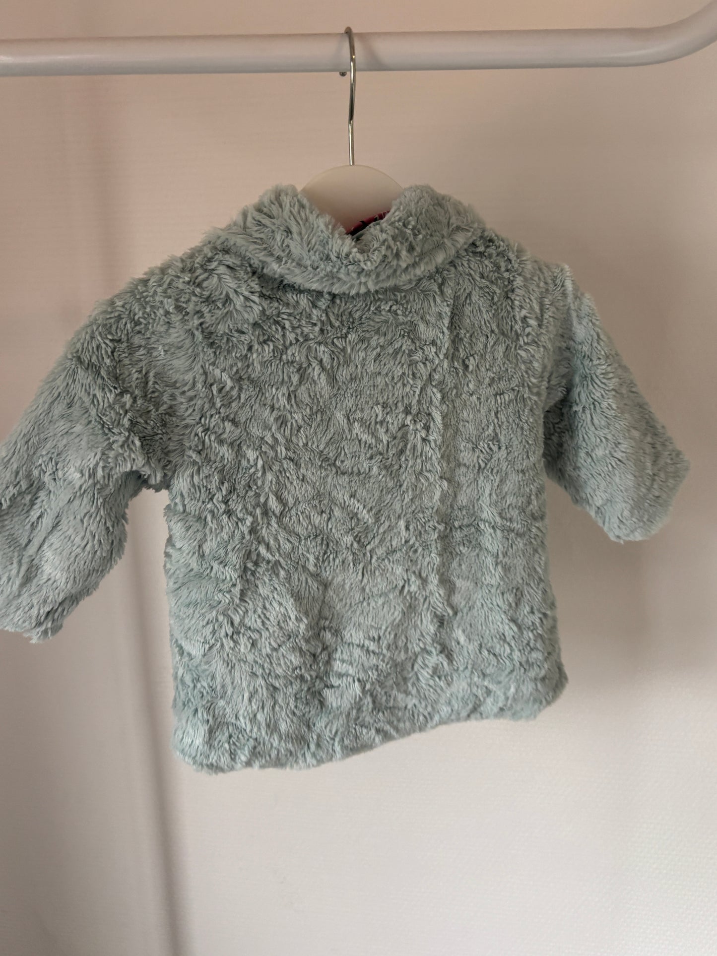 Lichtblauw winterjasje