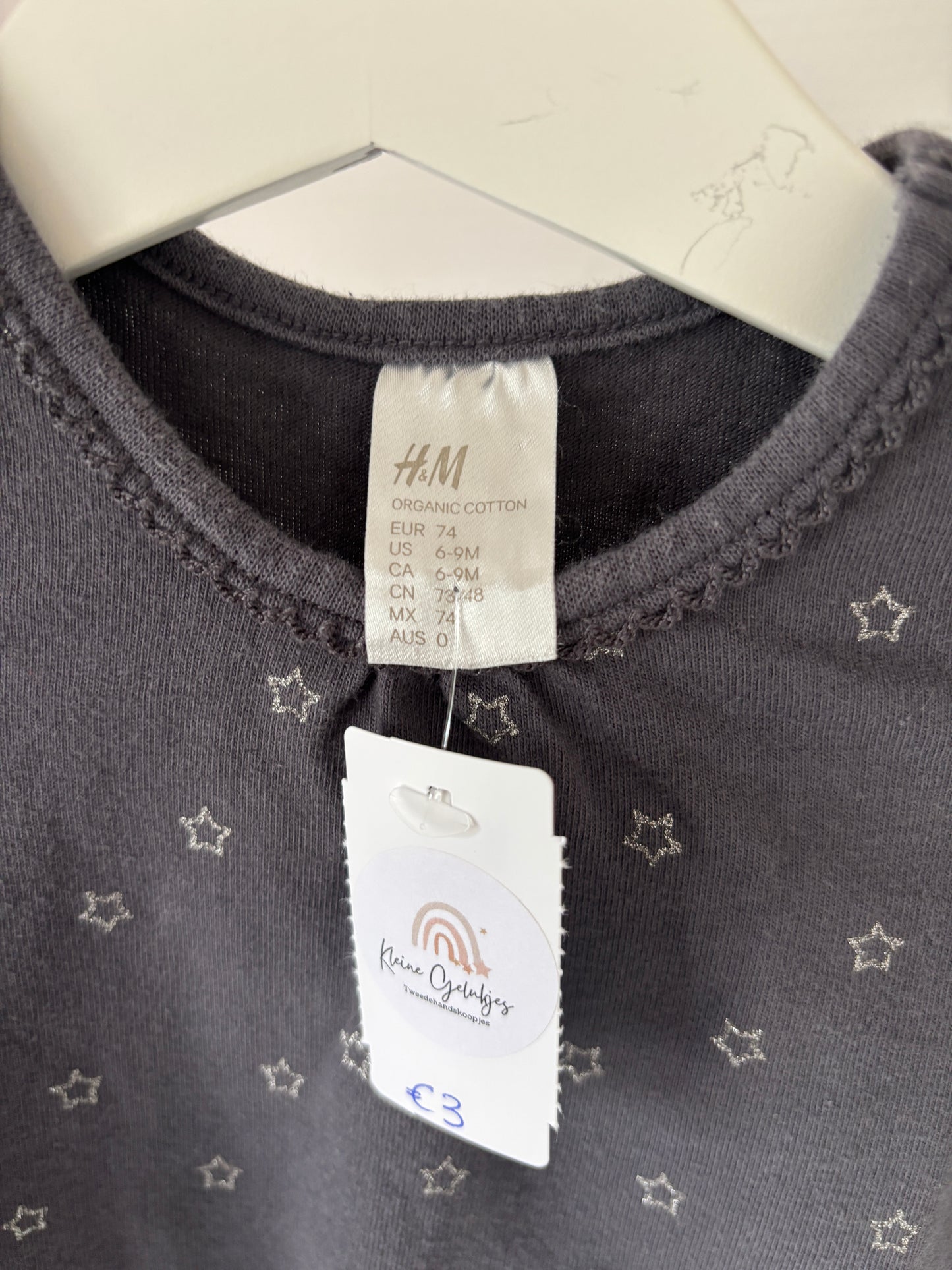 Grijs jurkje met sterretjes