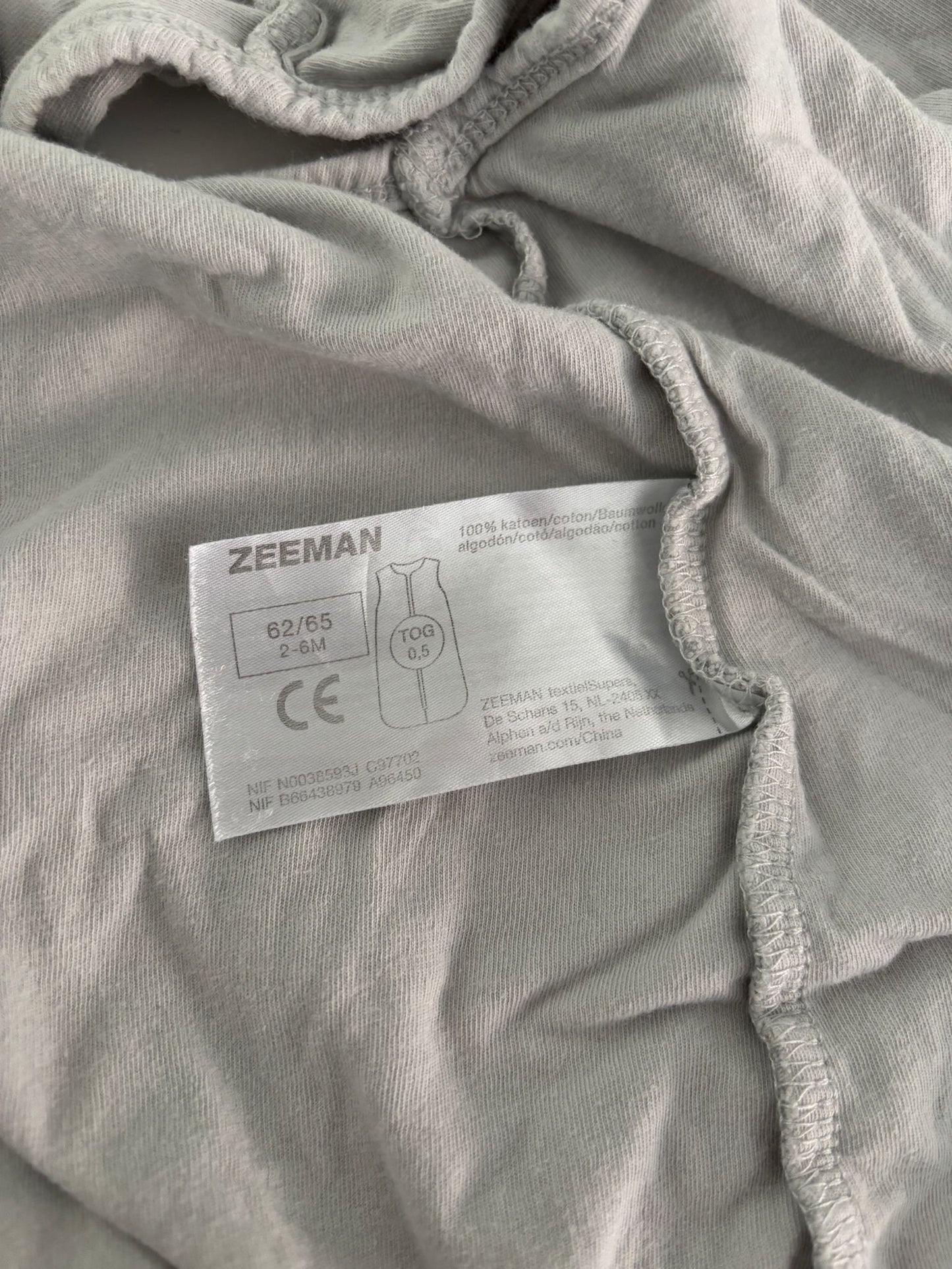 Blauwgrijze slaapzak met neushoorntjes