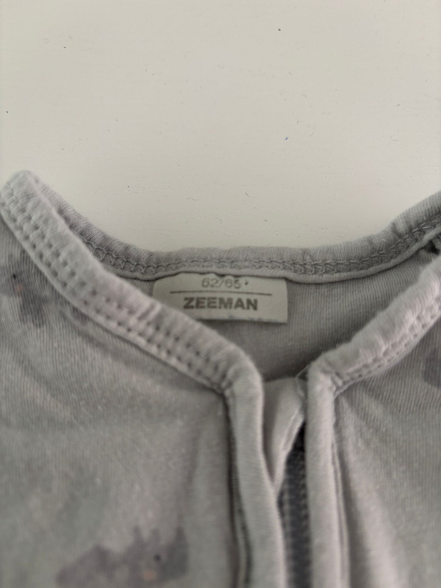 Blauwgrijze slaapzak met neushoorntjes