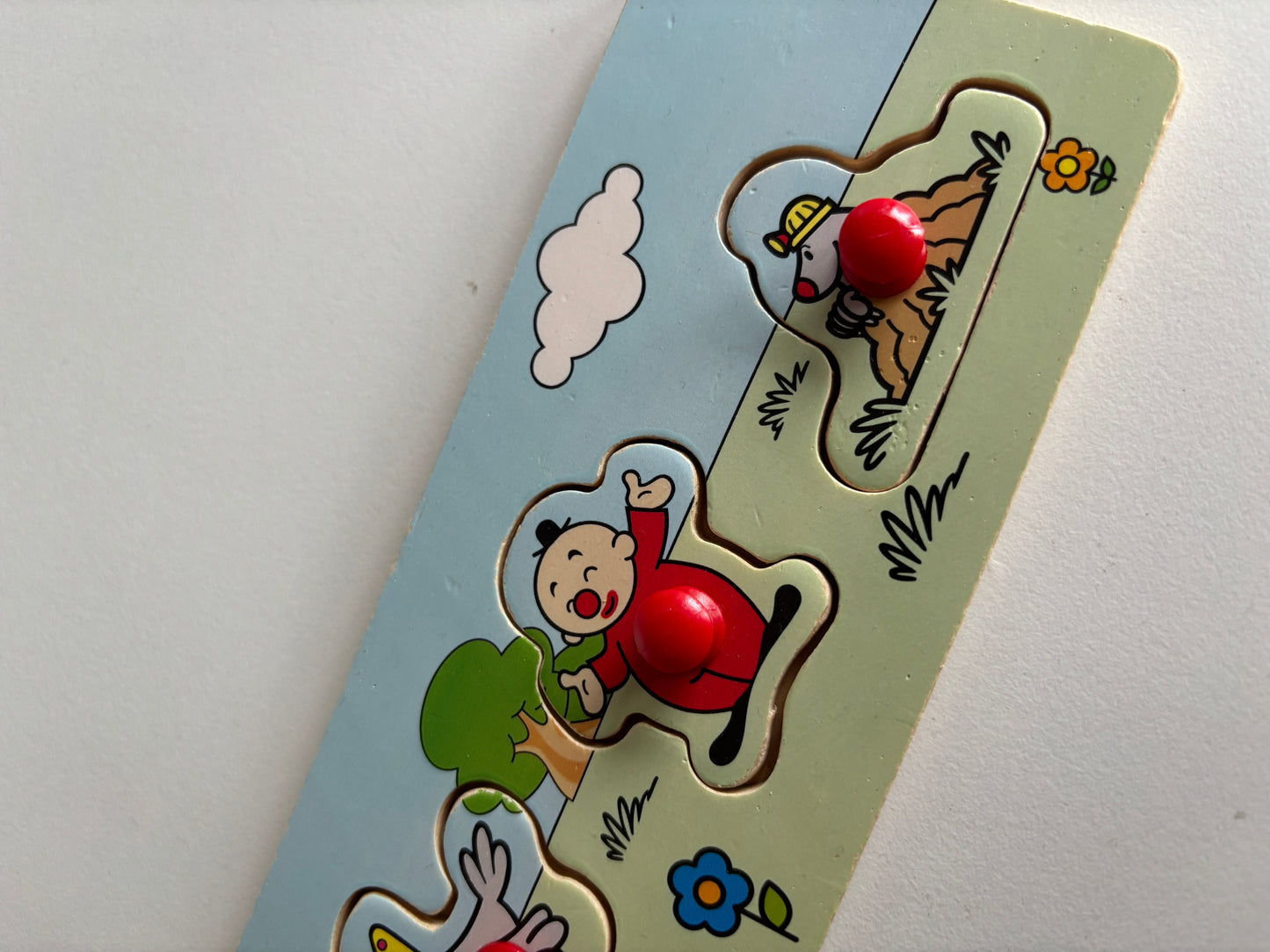 Houten knoppenpuzzel Bumba