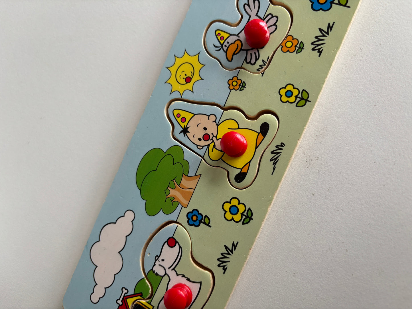 Houten knoppenpuzzel Bumba