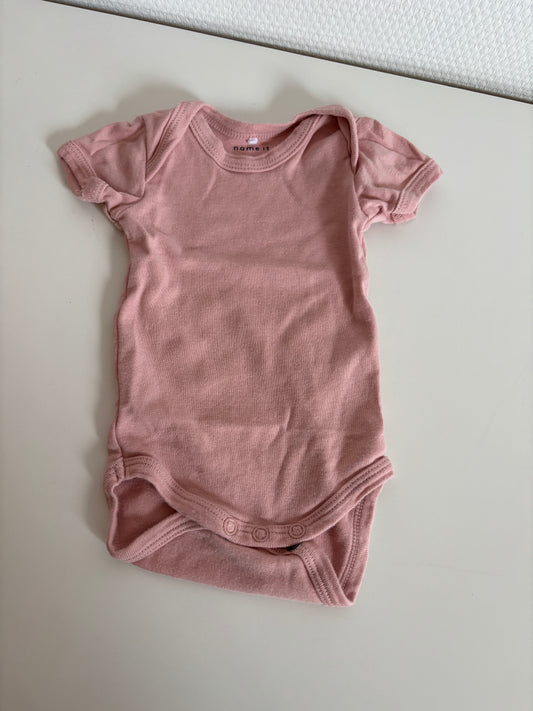 Roze romper met korte mouwen