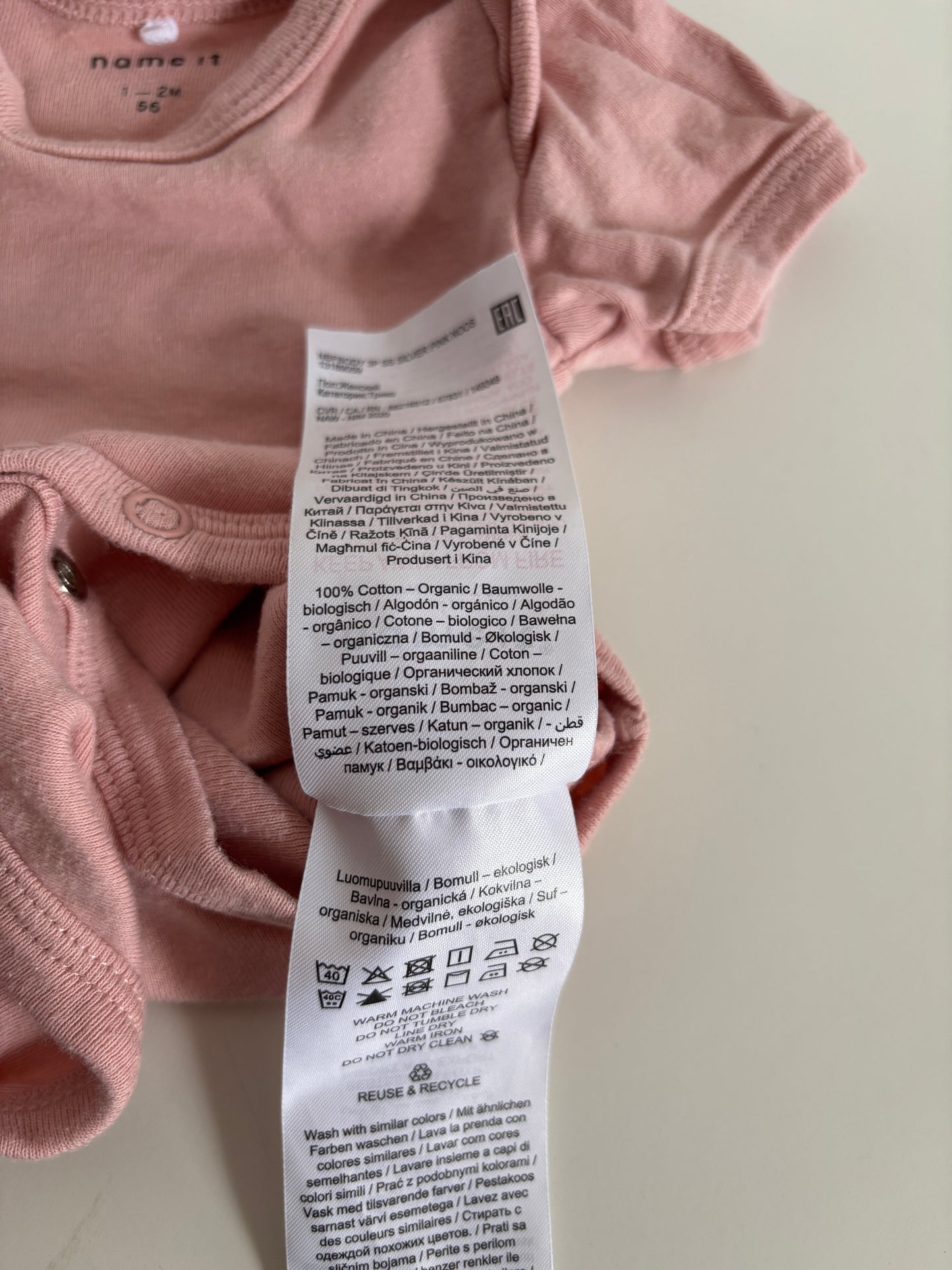 Roze romper met korte mouwen