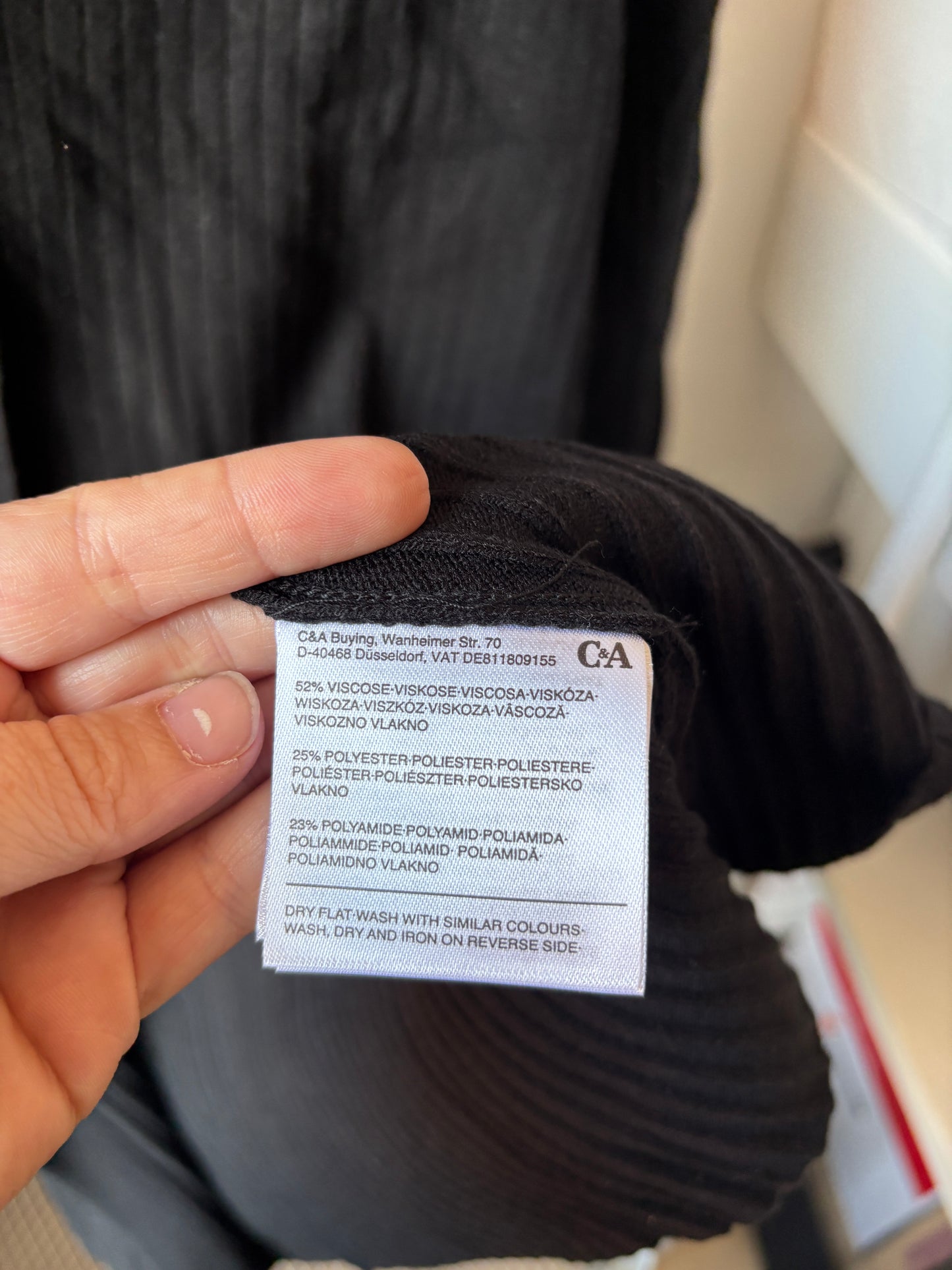 Zwarte gebreide vest met lint