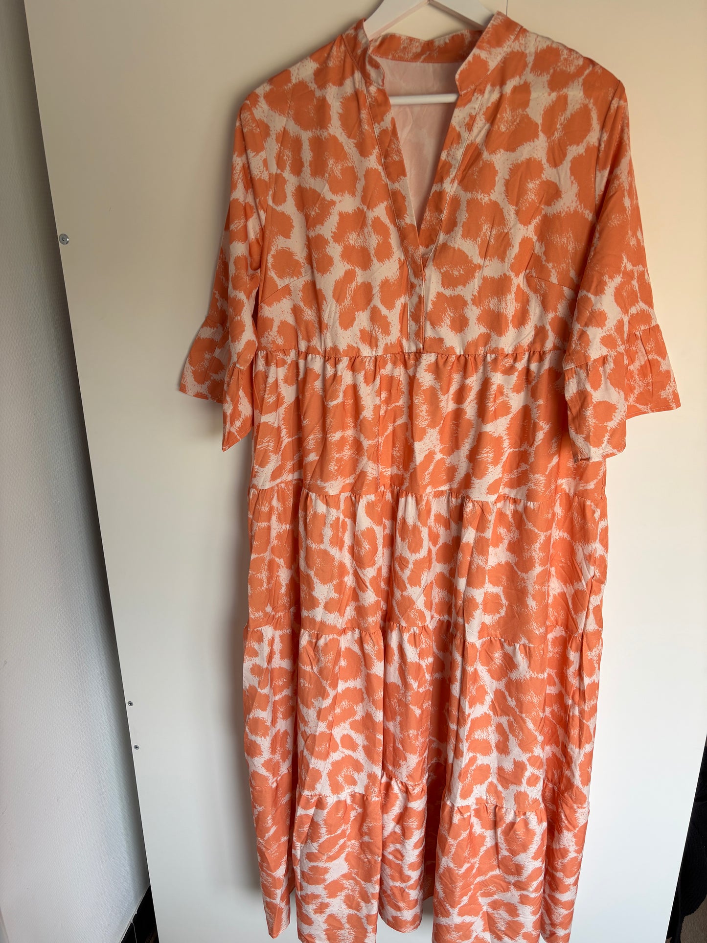 Pasteloranje lange jurk