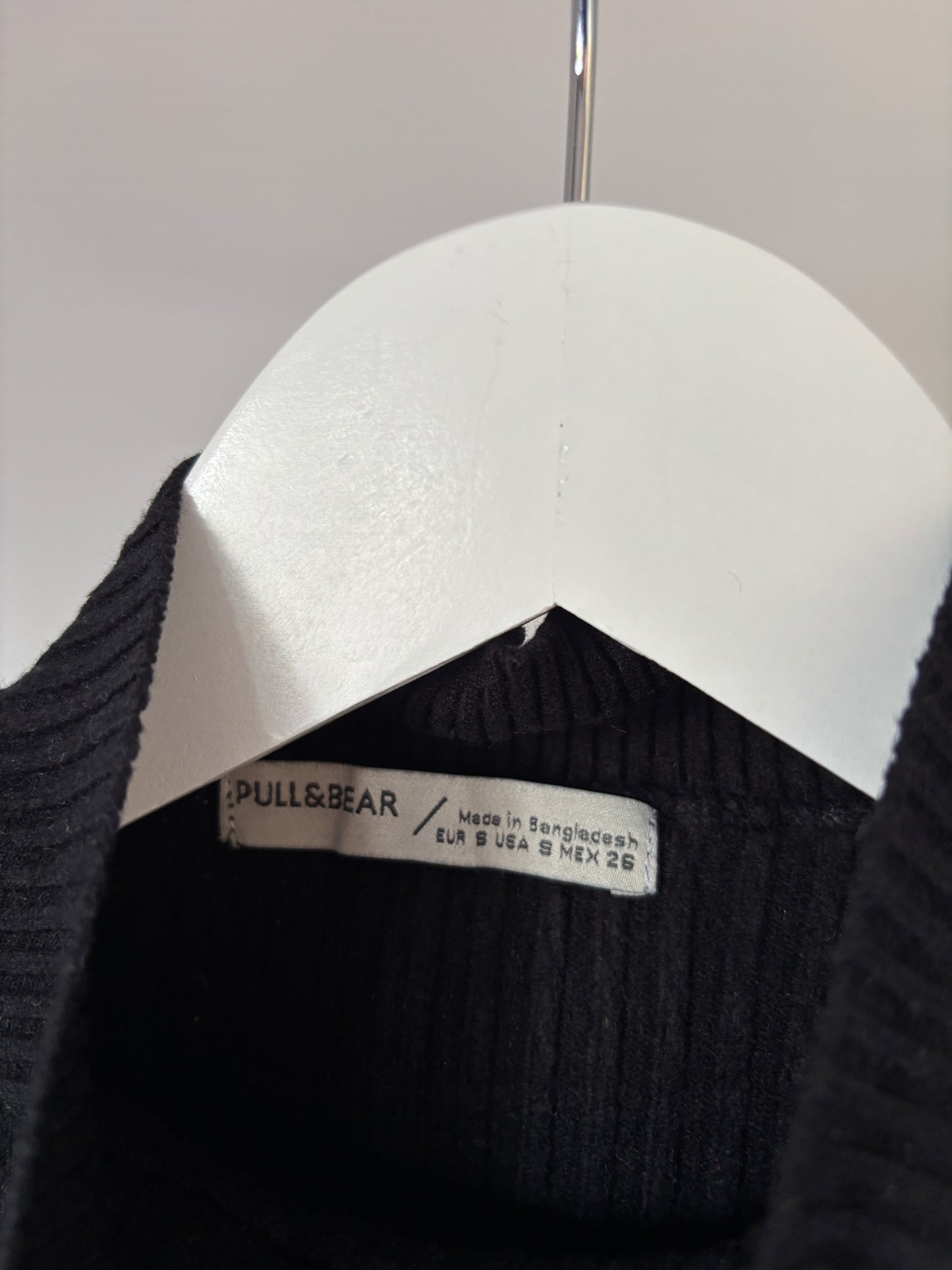 Zwarte riblongsleeve met rolkraag