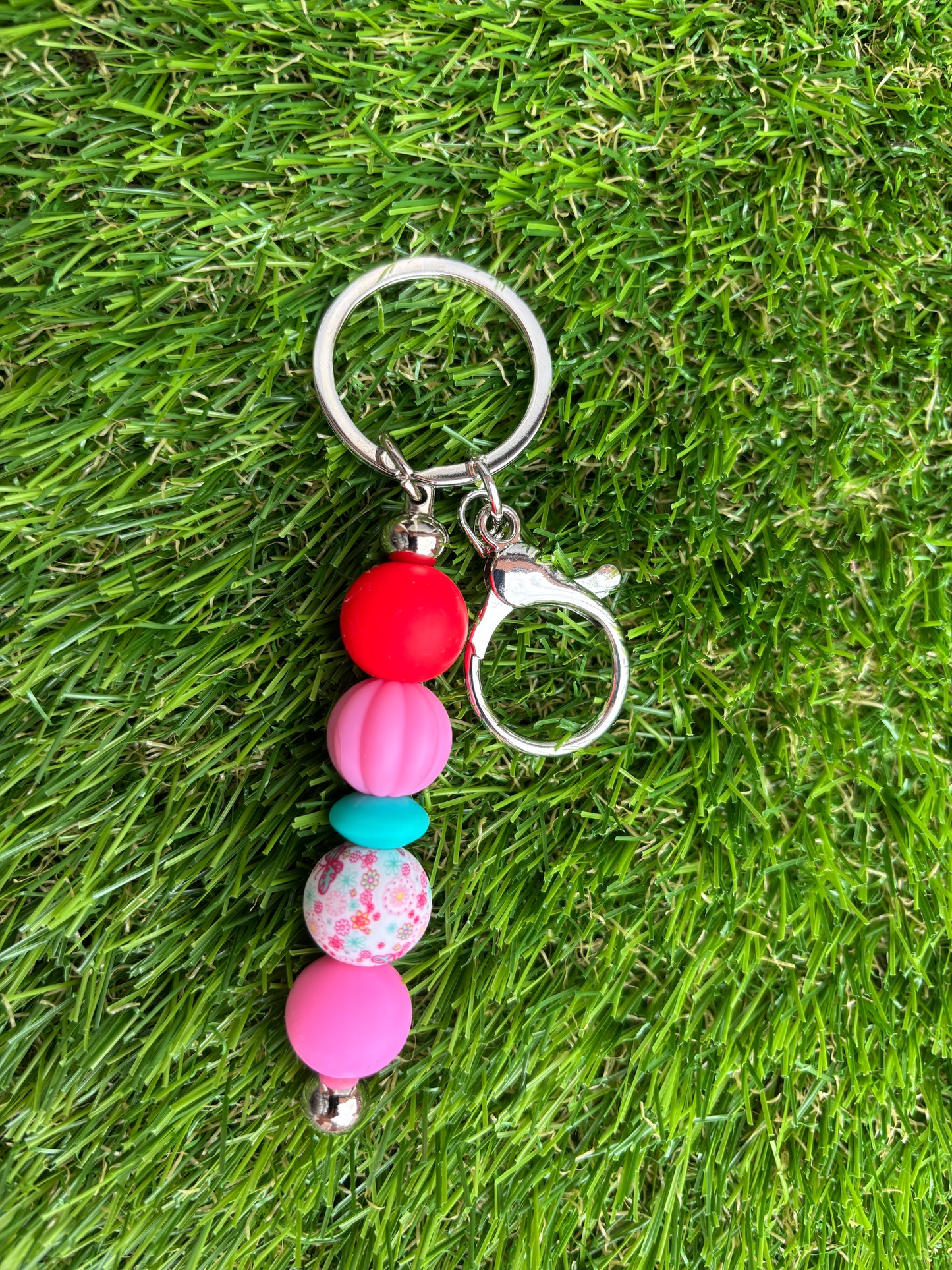 Sleutelhanger met siliconenkralen met bloemenprint