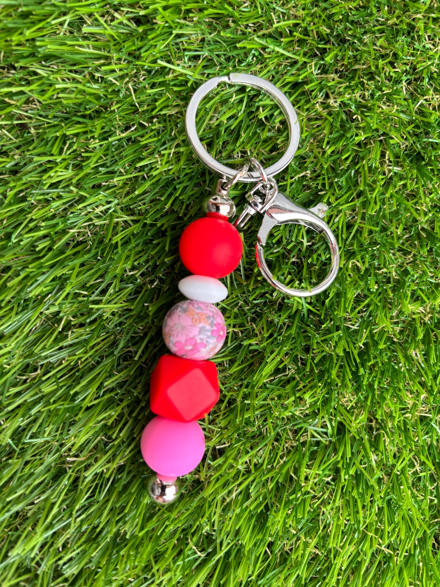 Sleutelhanger met siliconenkralen met bloemenprint