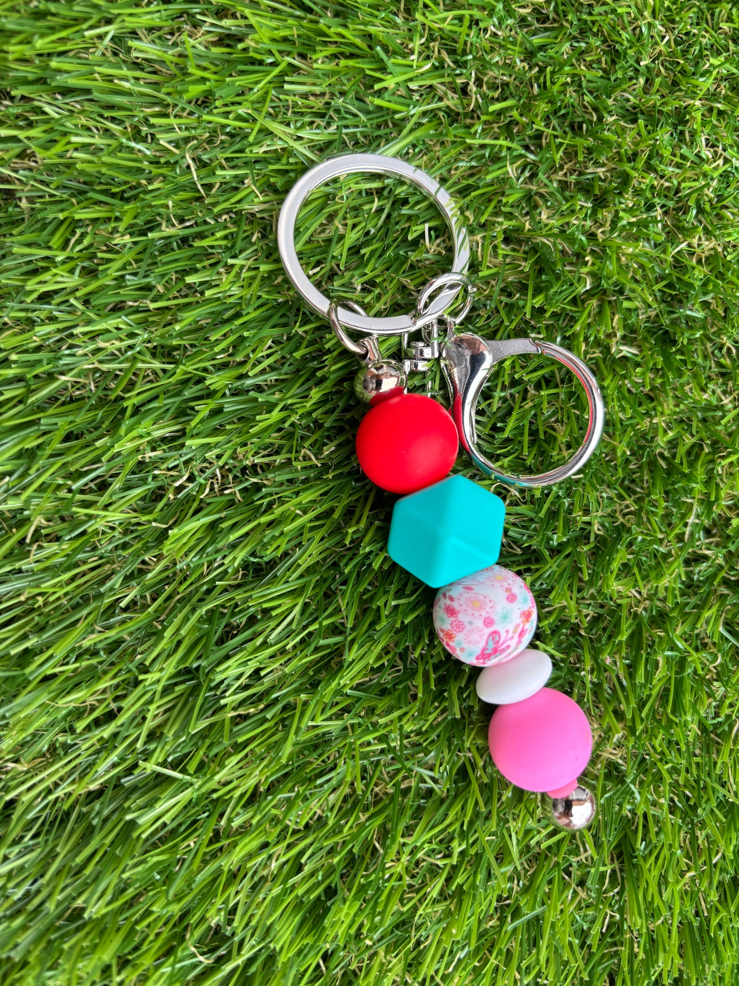 Sleutelhanger met siliconenkralen met bloemenprint