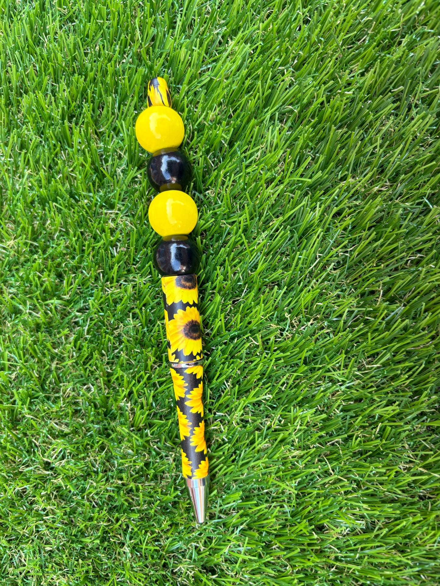 Zomerse balpen met houten kralen