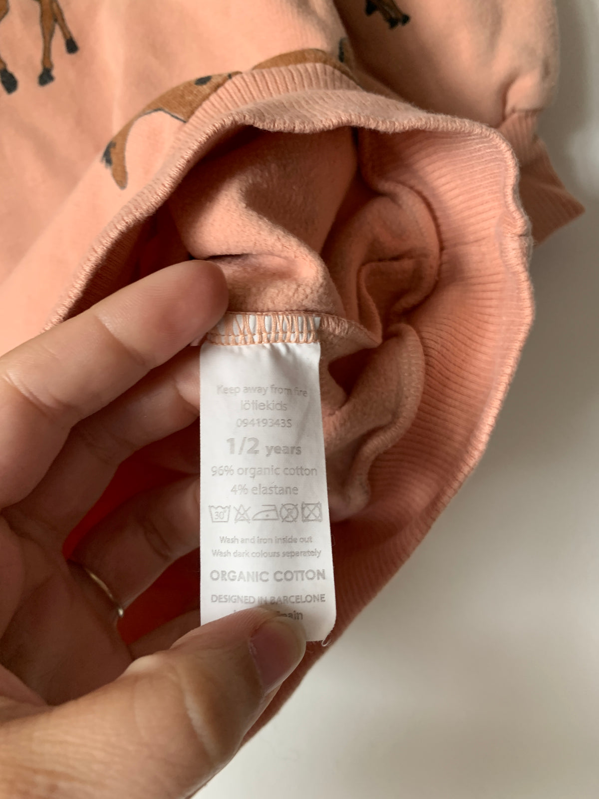Pasteloranje sweaterjurk | Lötie Kids | 86/92