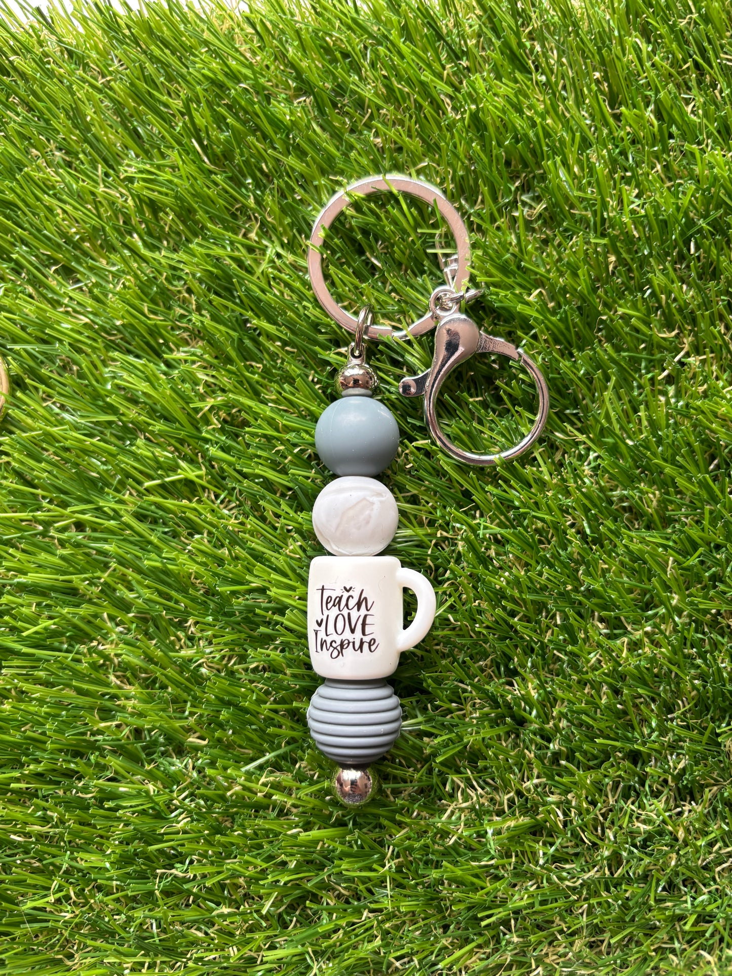 Sleutelhanger "Teach, love, inspire"