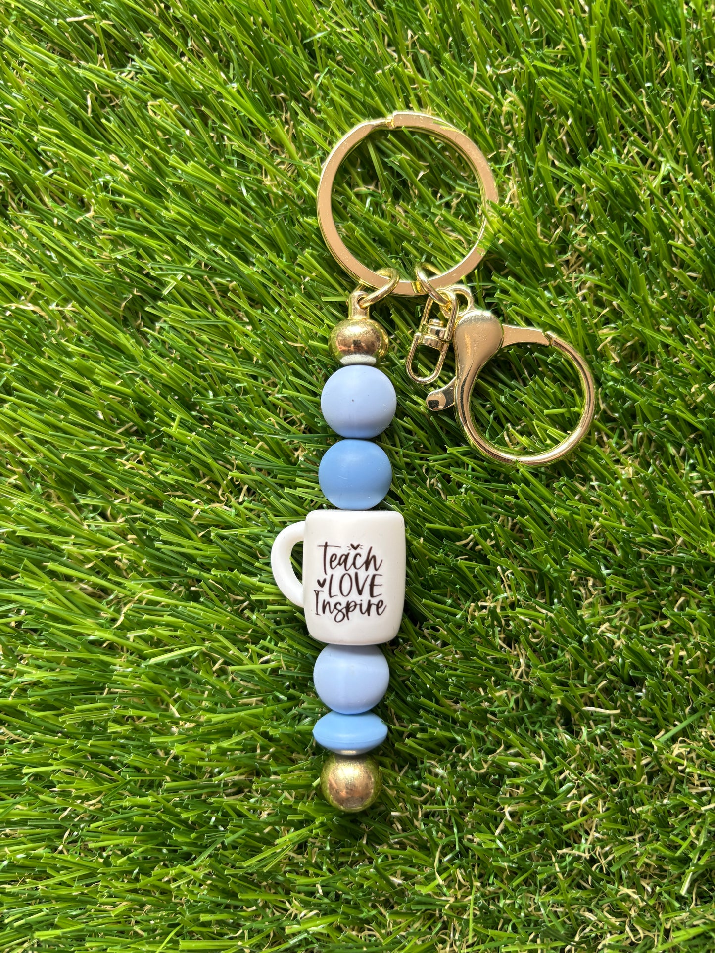 Sleutelhanger "Teach, love, inspire"